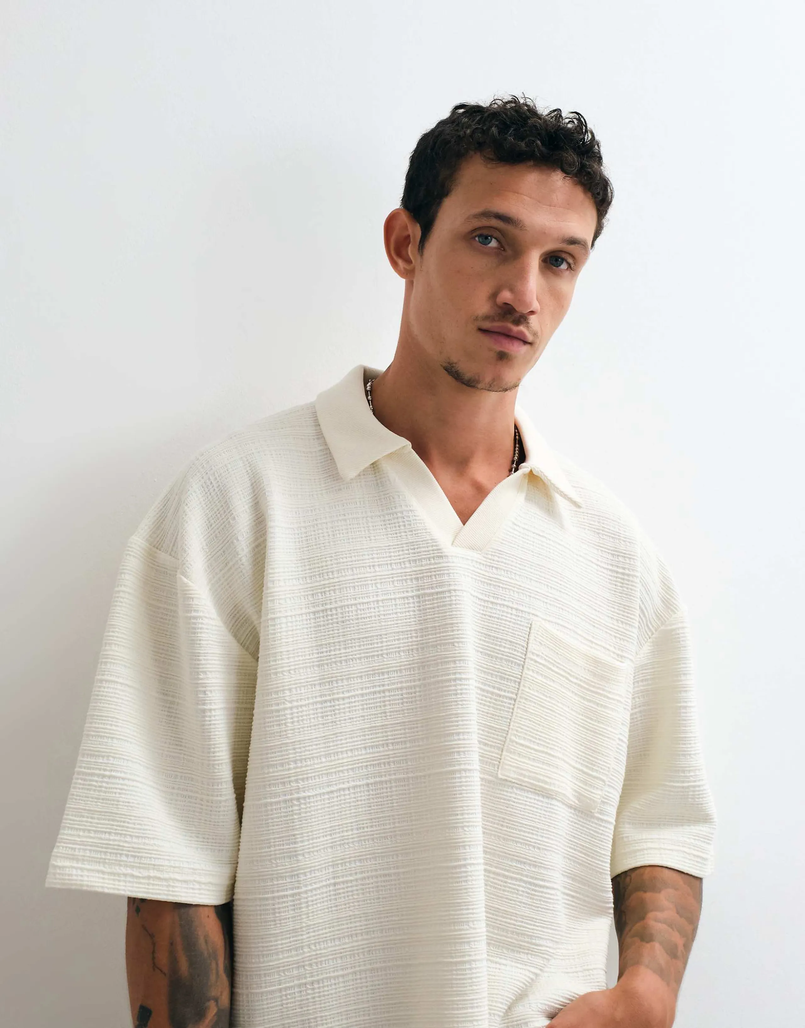 ASOS DESIGN oversized 3/4 length sleeve polo shirt in beige textured fabric