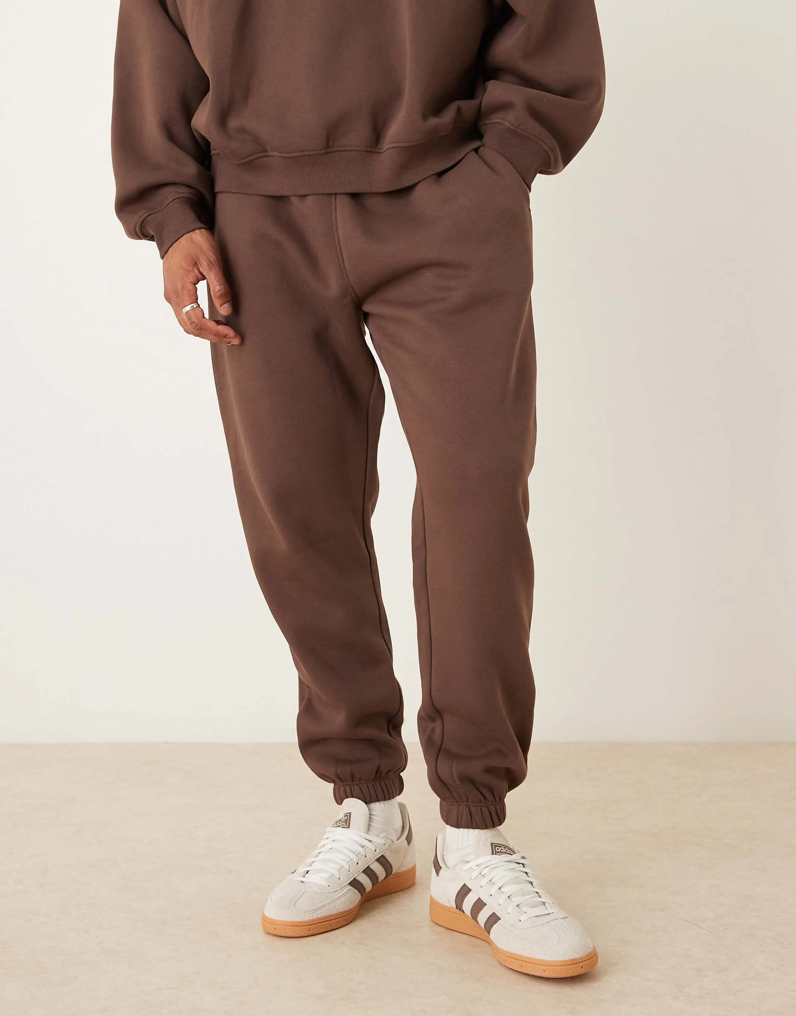 ASOS DESIGN essential straight leg sweatpants in brown