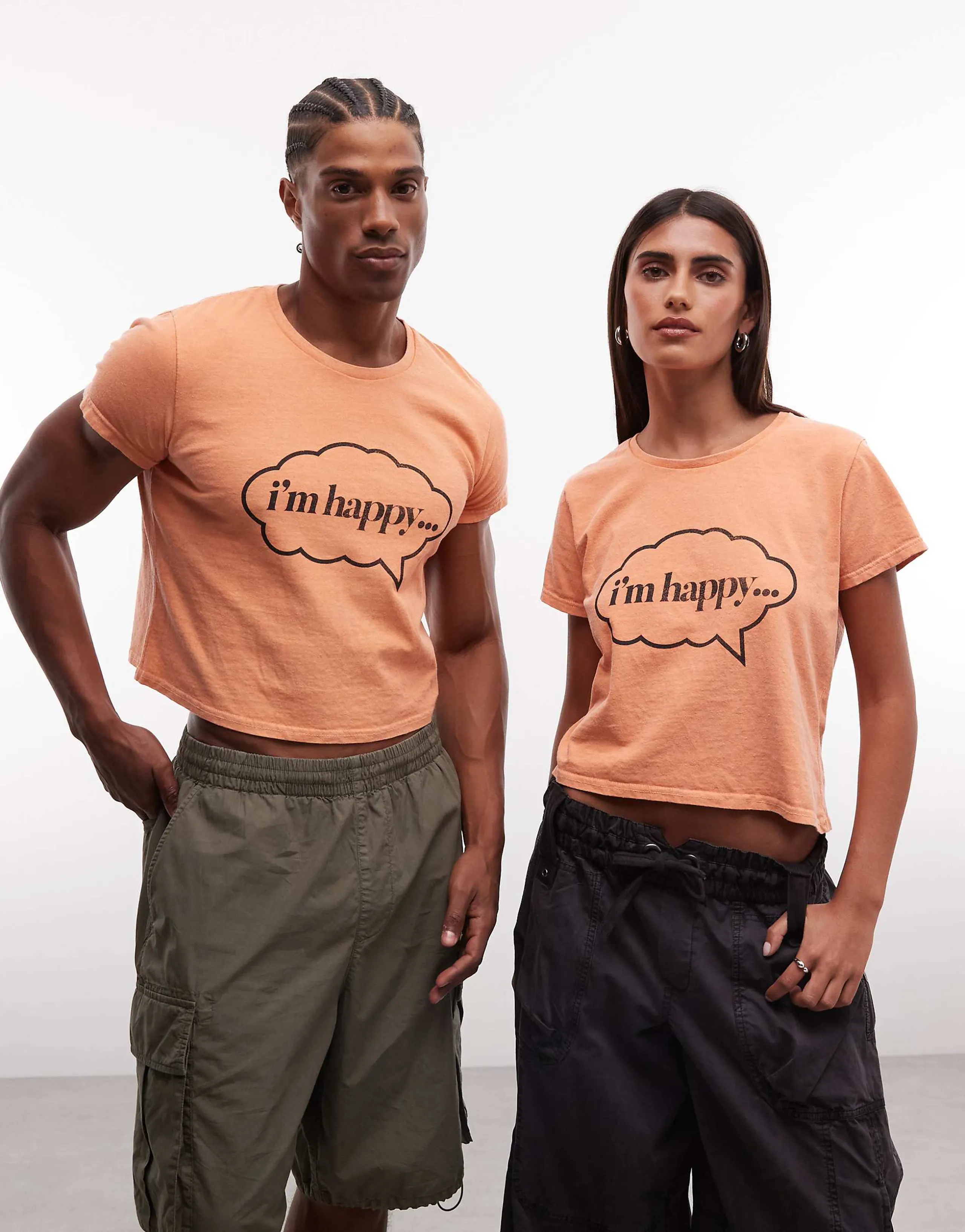 Reclaimed Vintage Unisex boxy cropped slogan t-shirt in orange