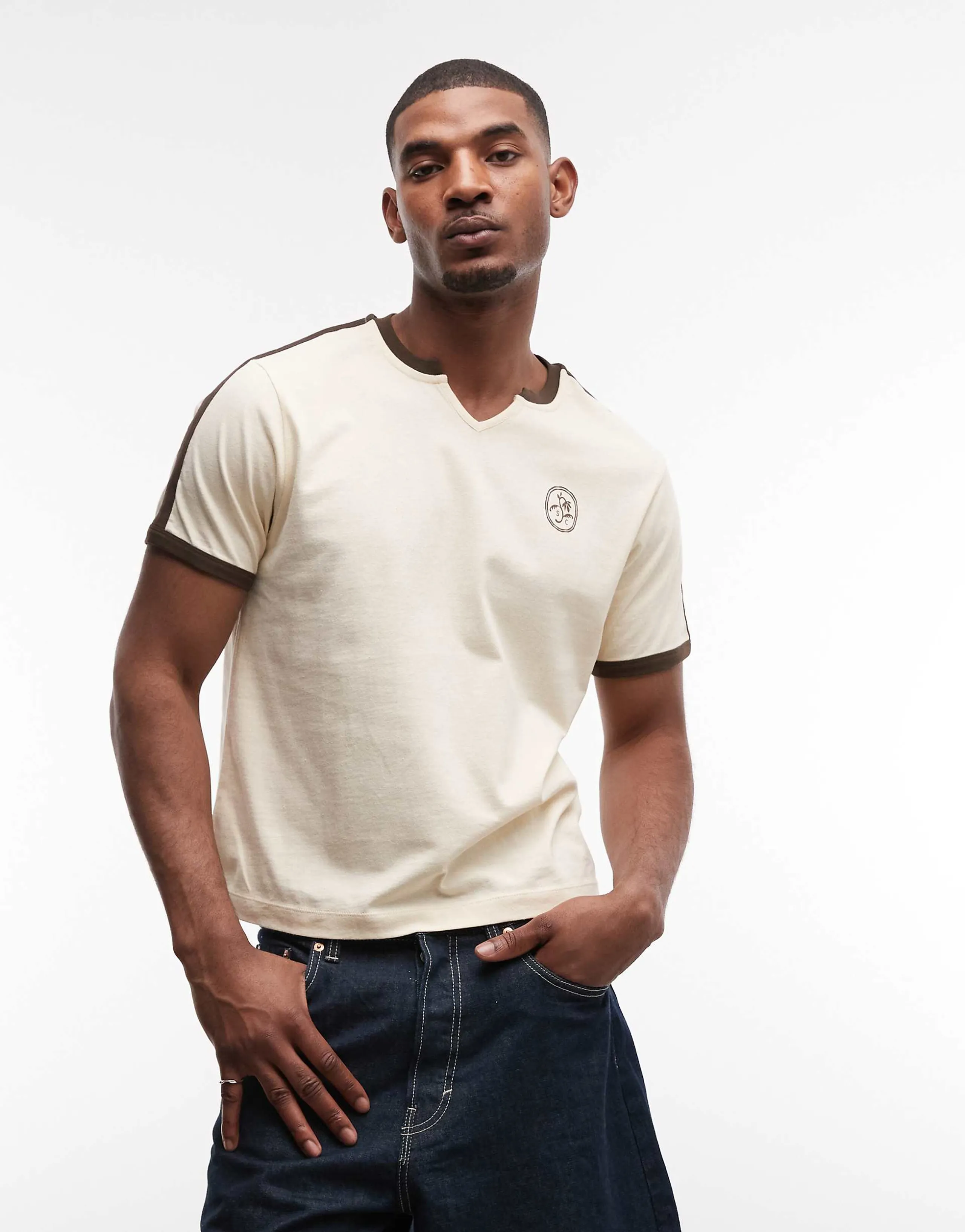 ASOS DESIGN boxy oversized T-shirt with chest graphic and piping detail in beige