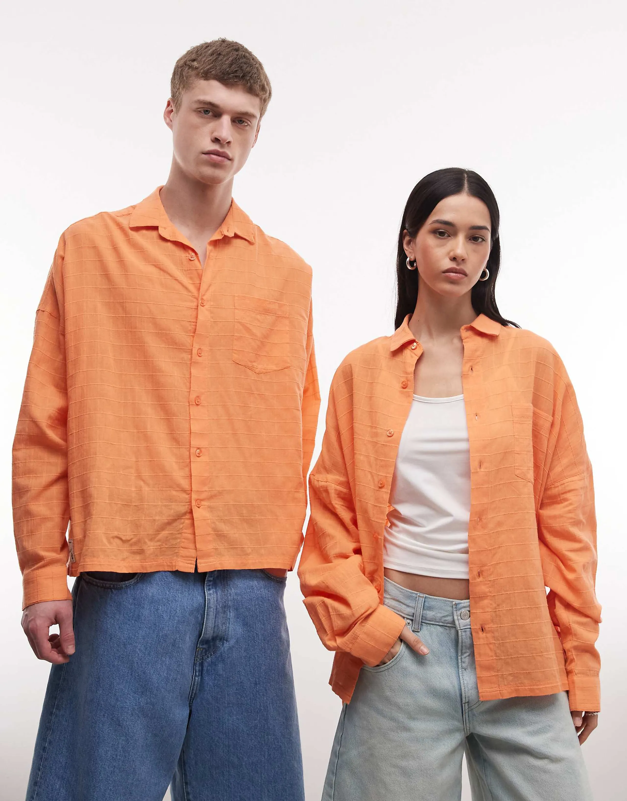 COLLUSION Unisex oversized long sleeve textured grid plaid shirt in orange