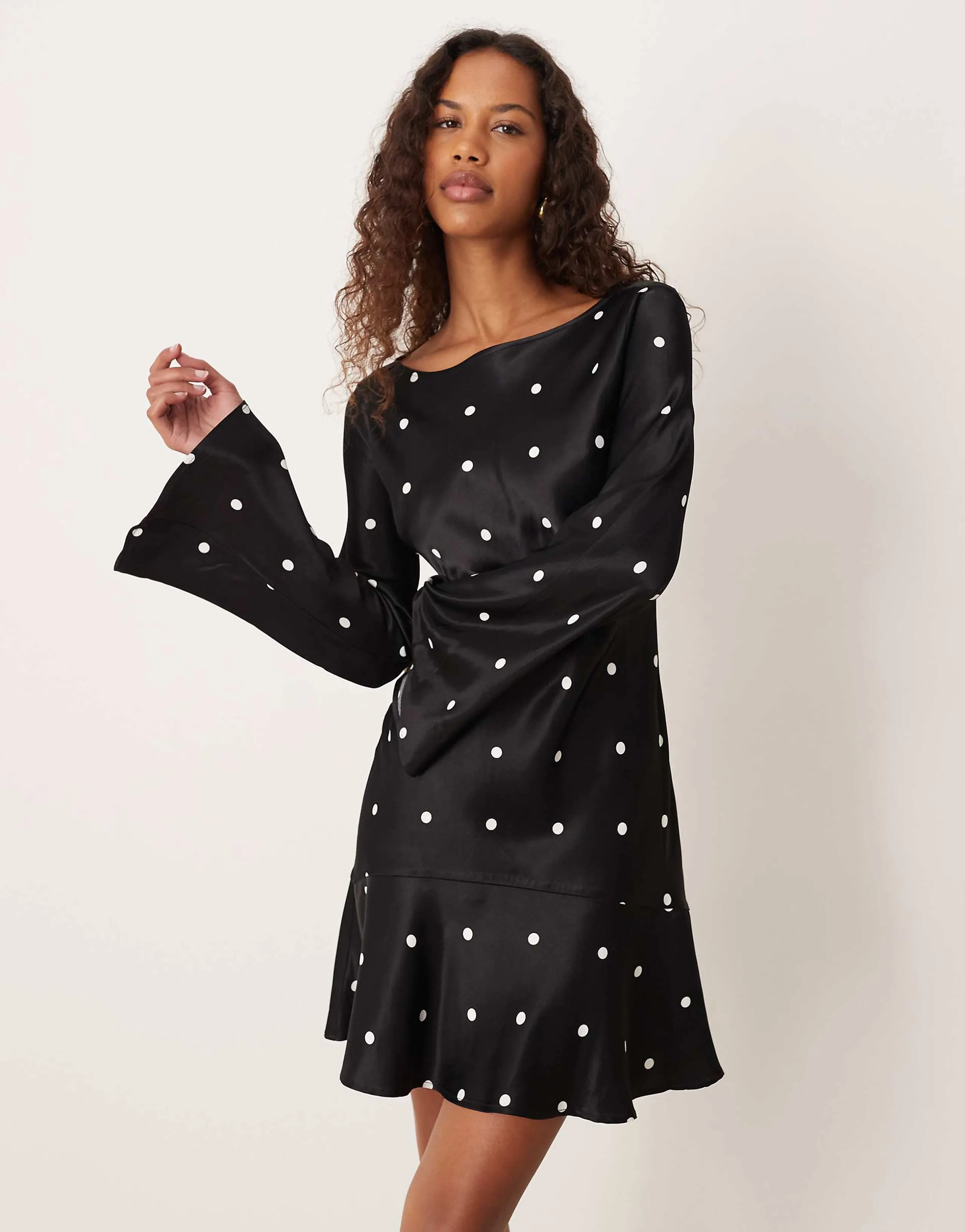 ASOS DESIGN flare sleeve satin mini dress in black-based polka dots
