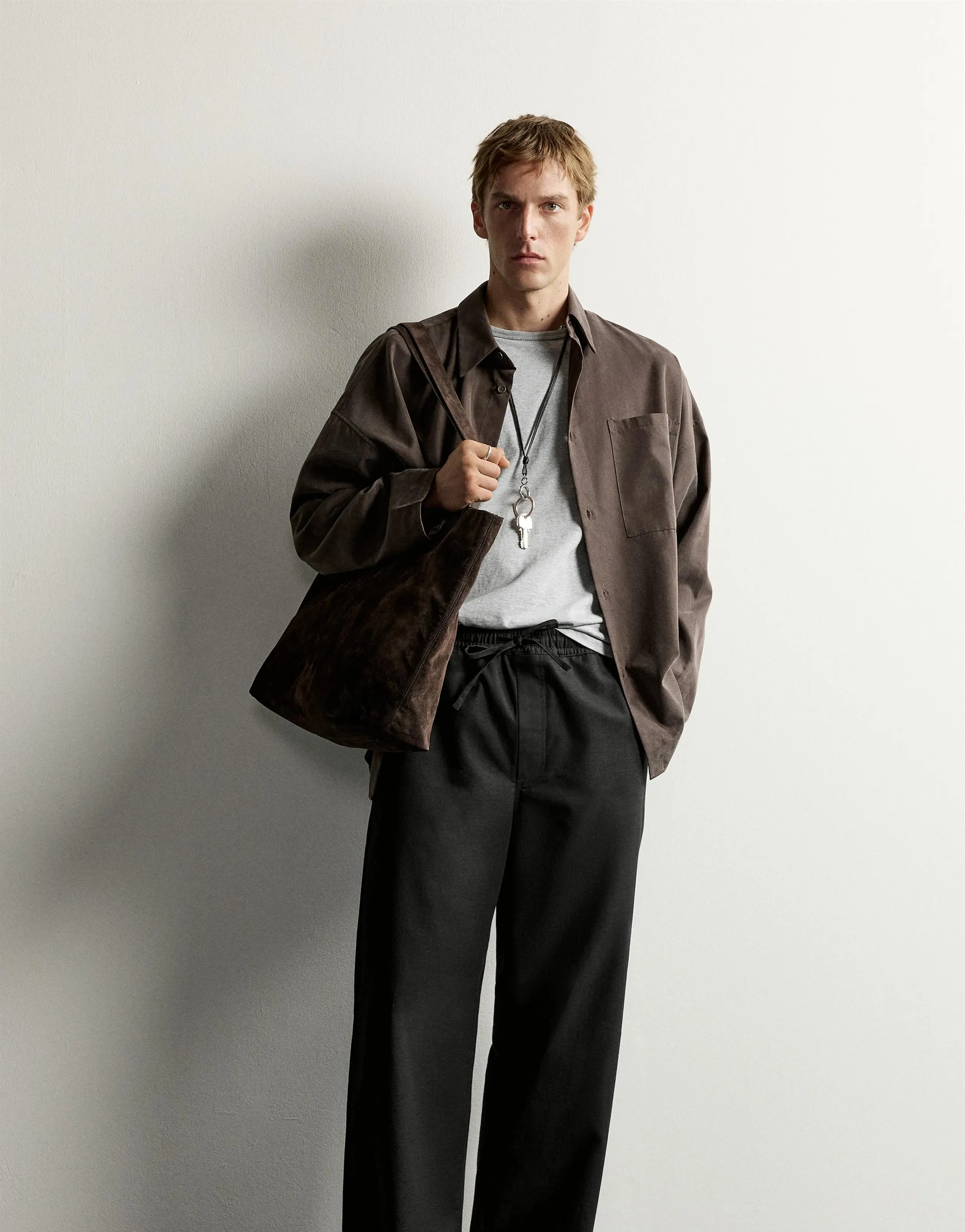 RELAXED FIT BUTTON TROUSERS