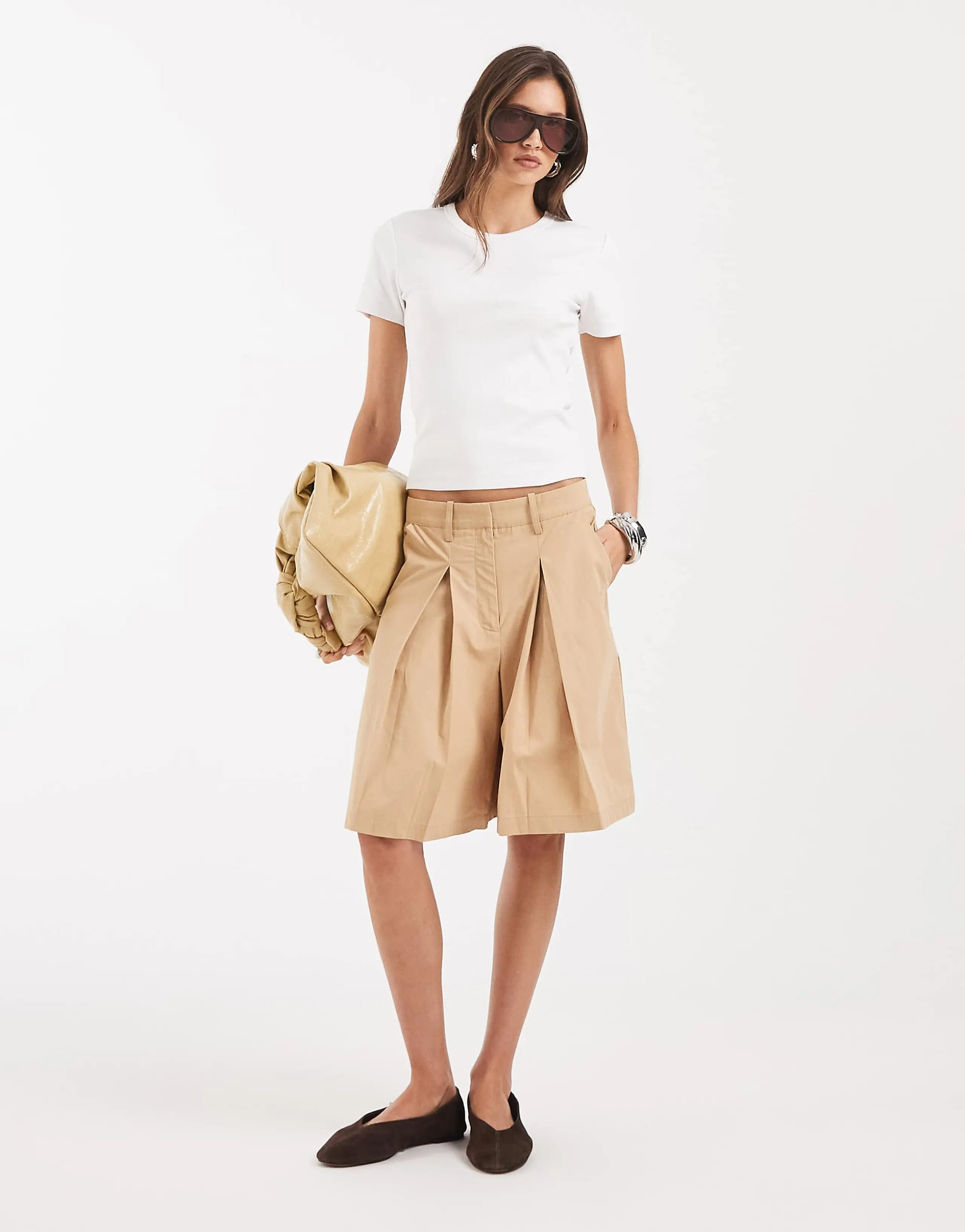 AWARE deep pleated front longline shorts in beige