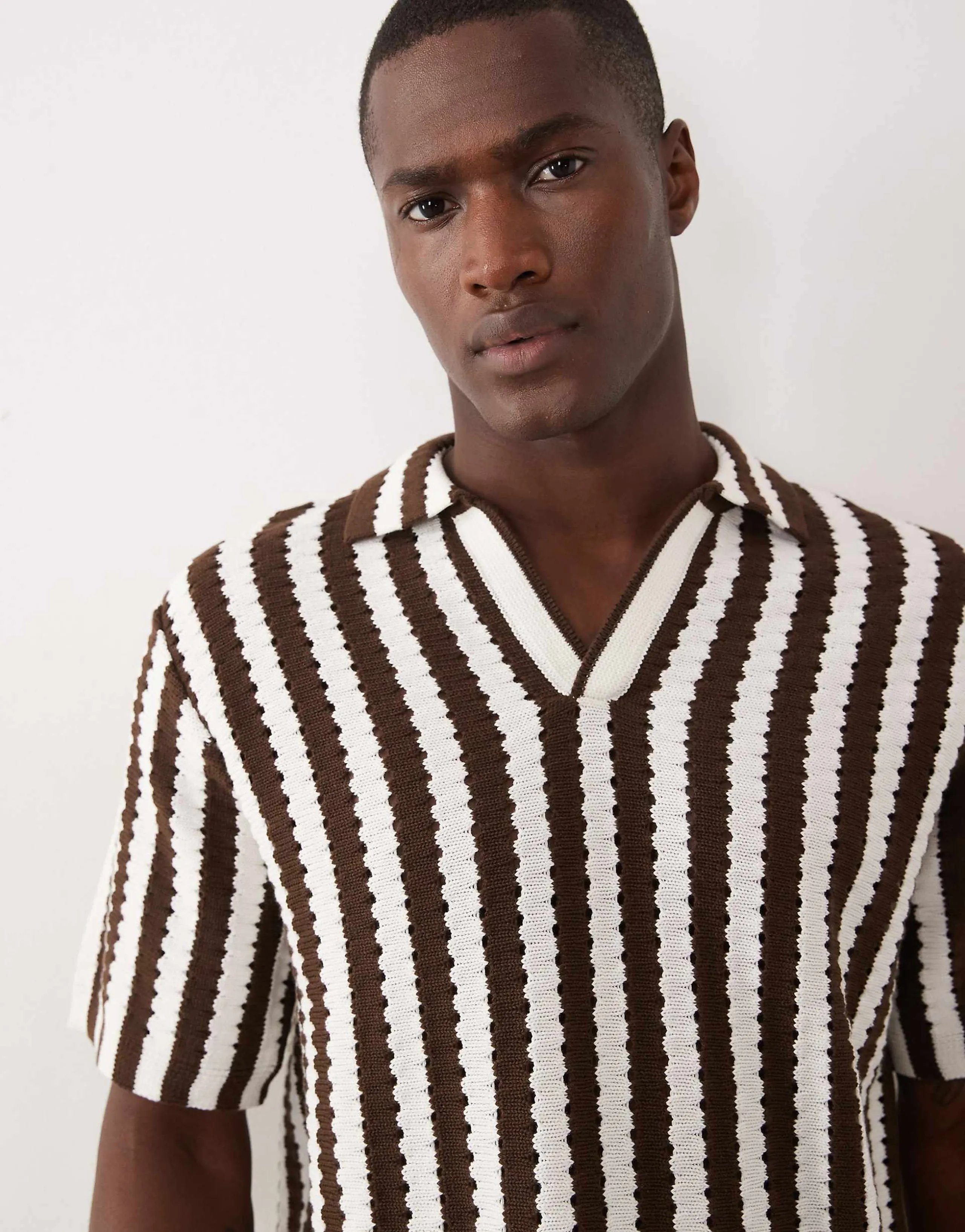 ASOS DESIGN knit relaxed textured notch neck polo in ecru and brown stripe