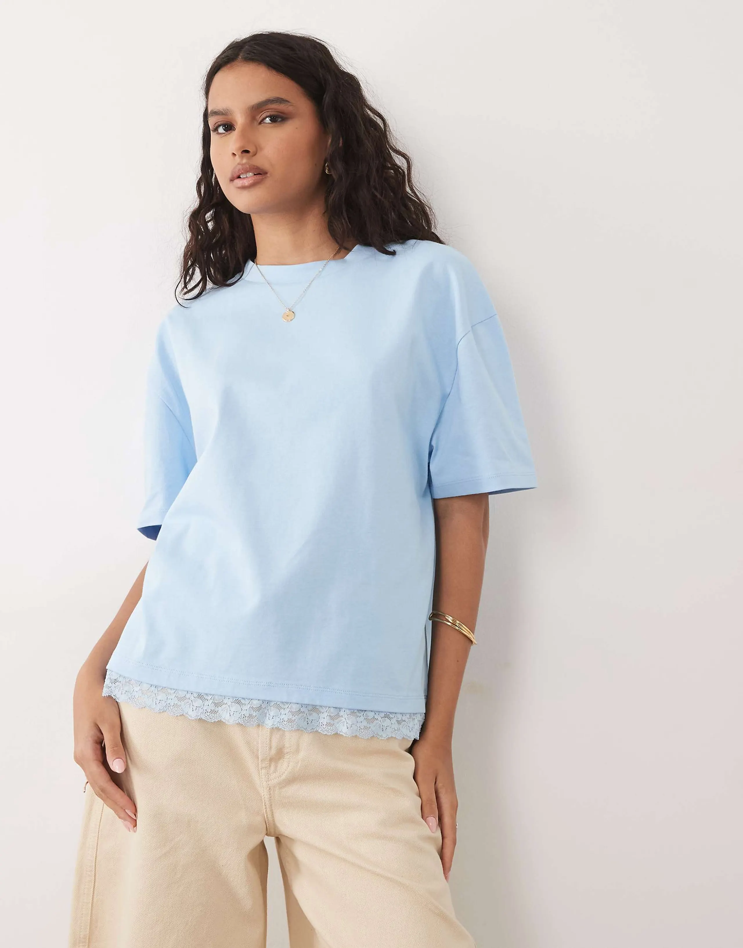ASOS DESIGN oversized T-shirt with lace trim at hem set in light blue