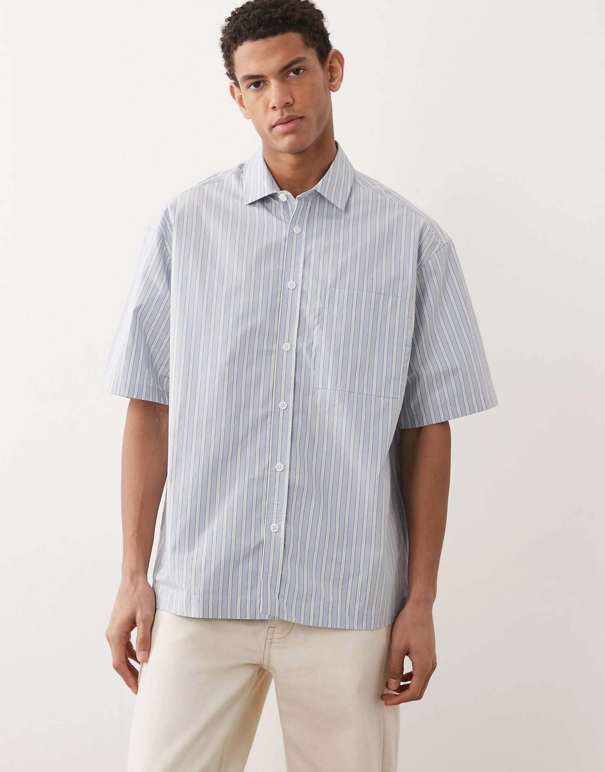 ASOS DESIGN oversized striped shirt with chest pocket in blue