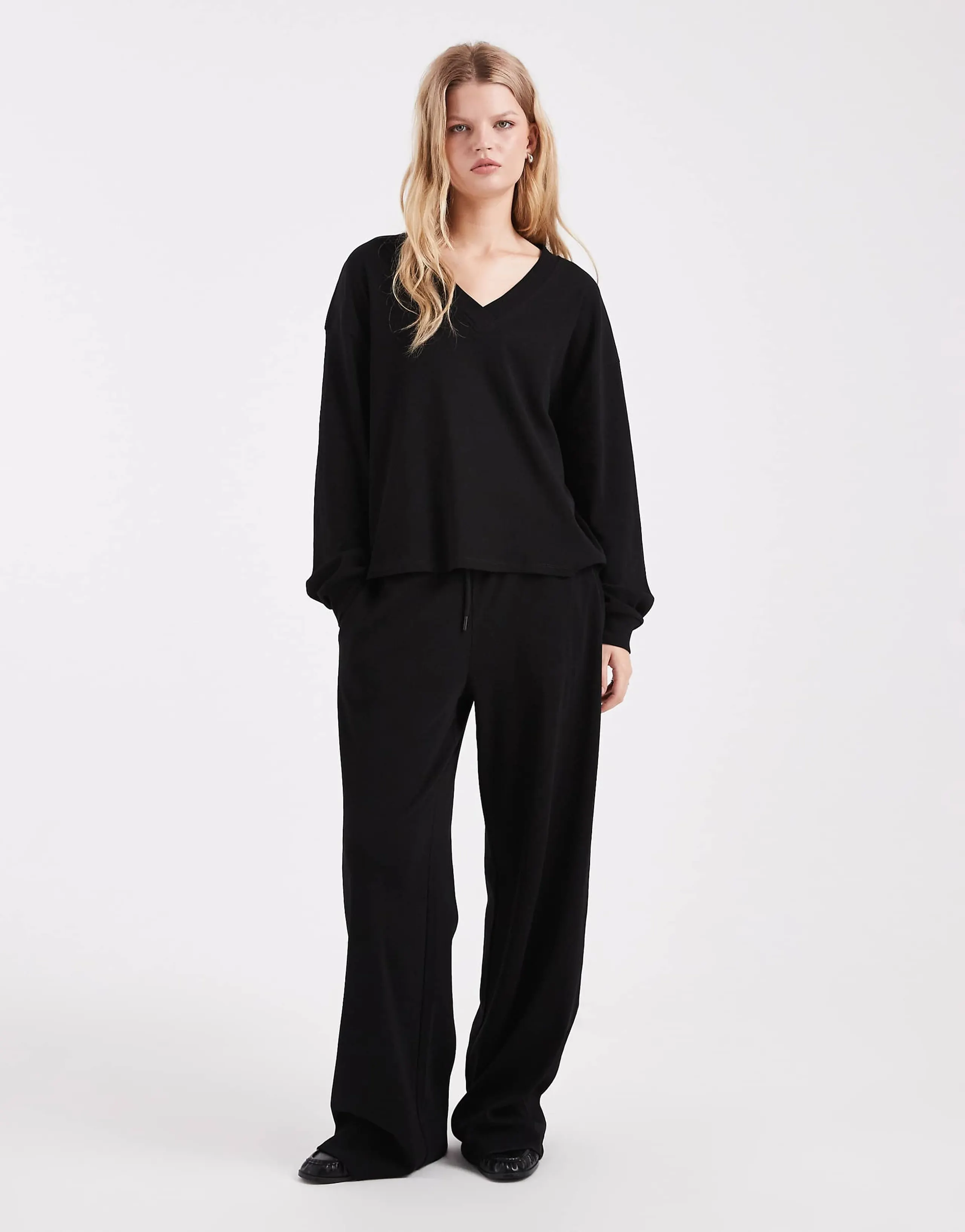 ASOS DESIGN wide leg ribbed sweatpants in black - part of a set