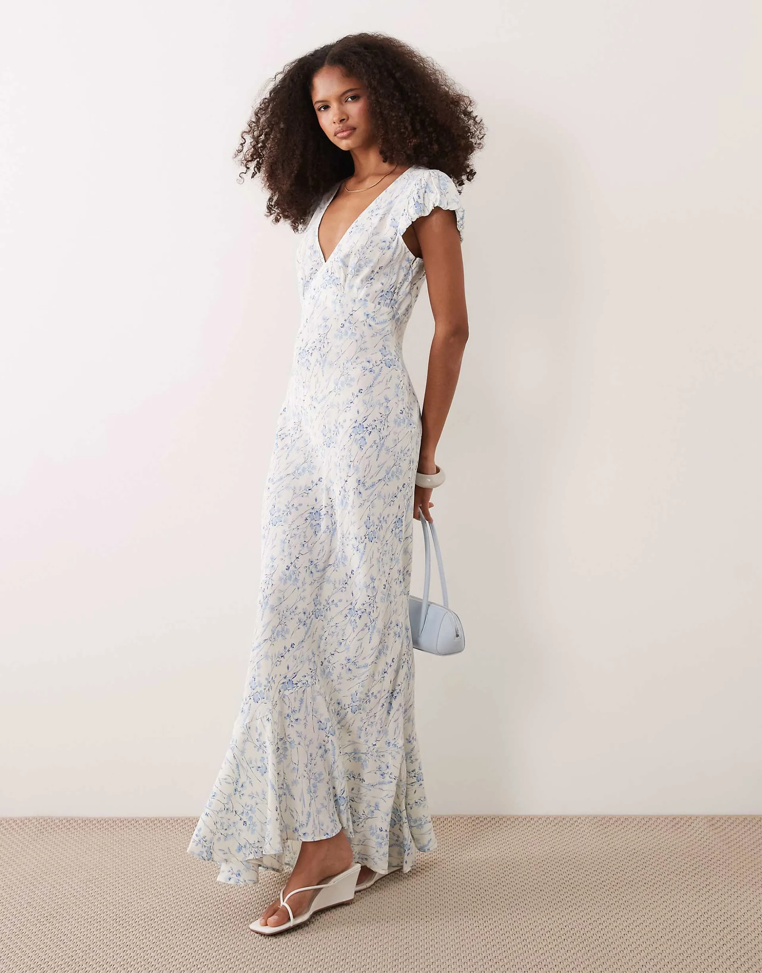 ASOS DESIGN puff sleeve v-neck maxi day dress in blue floral