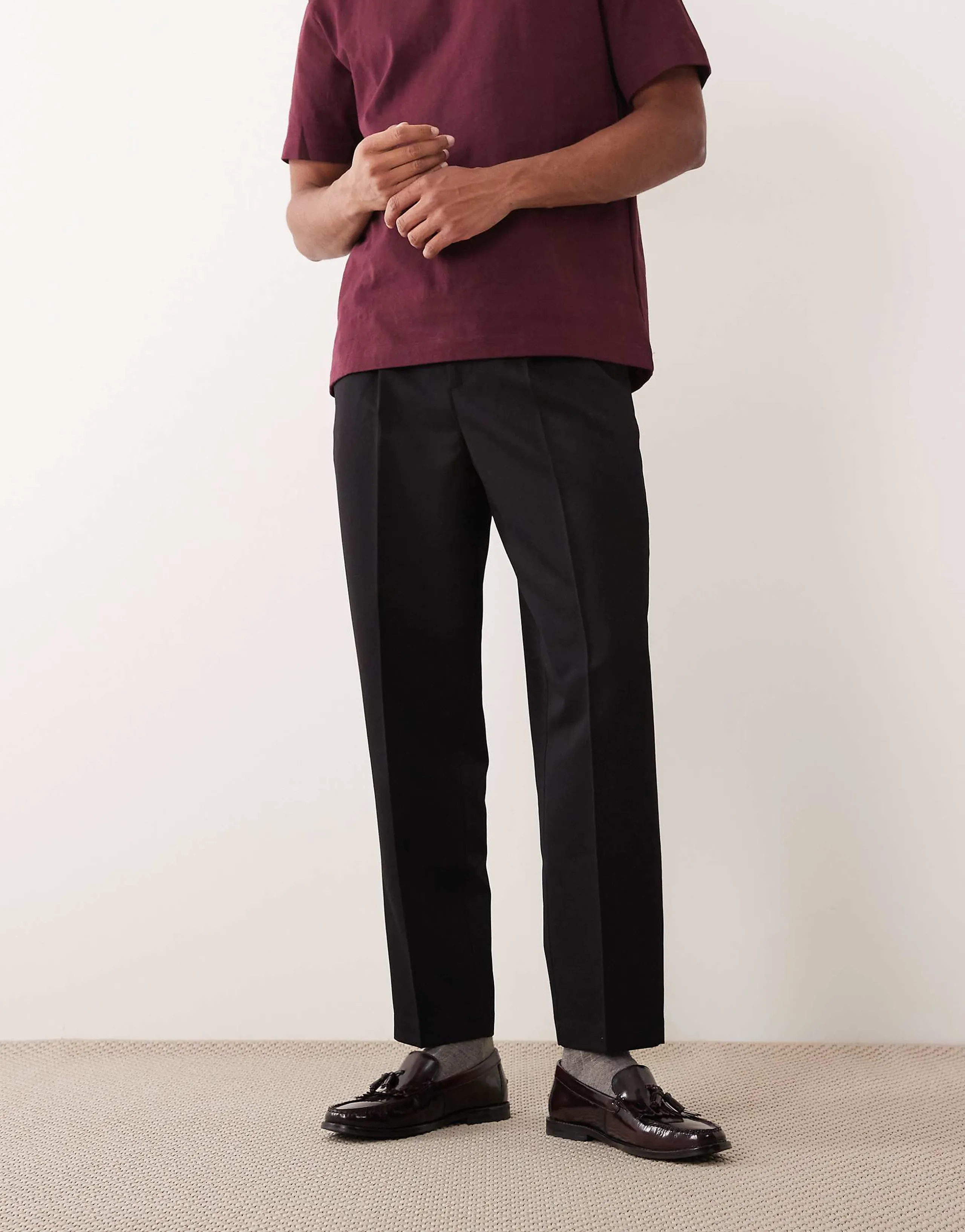 ASOS DESIGN pleated relaxed tapered dress pants in black