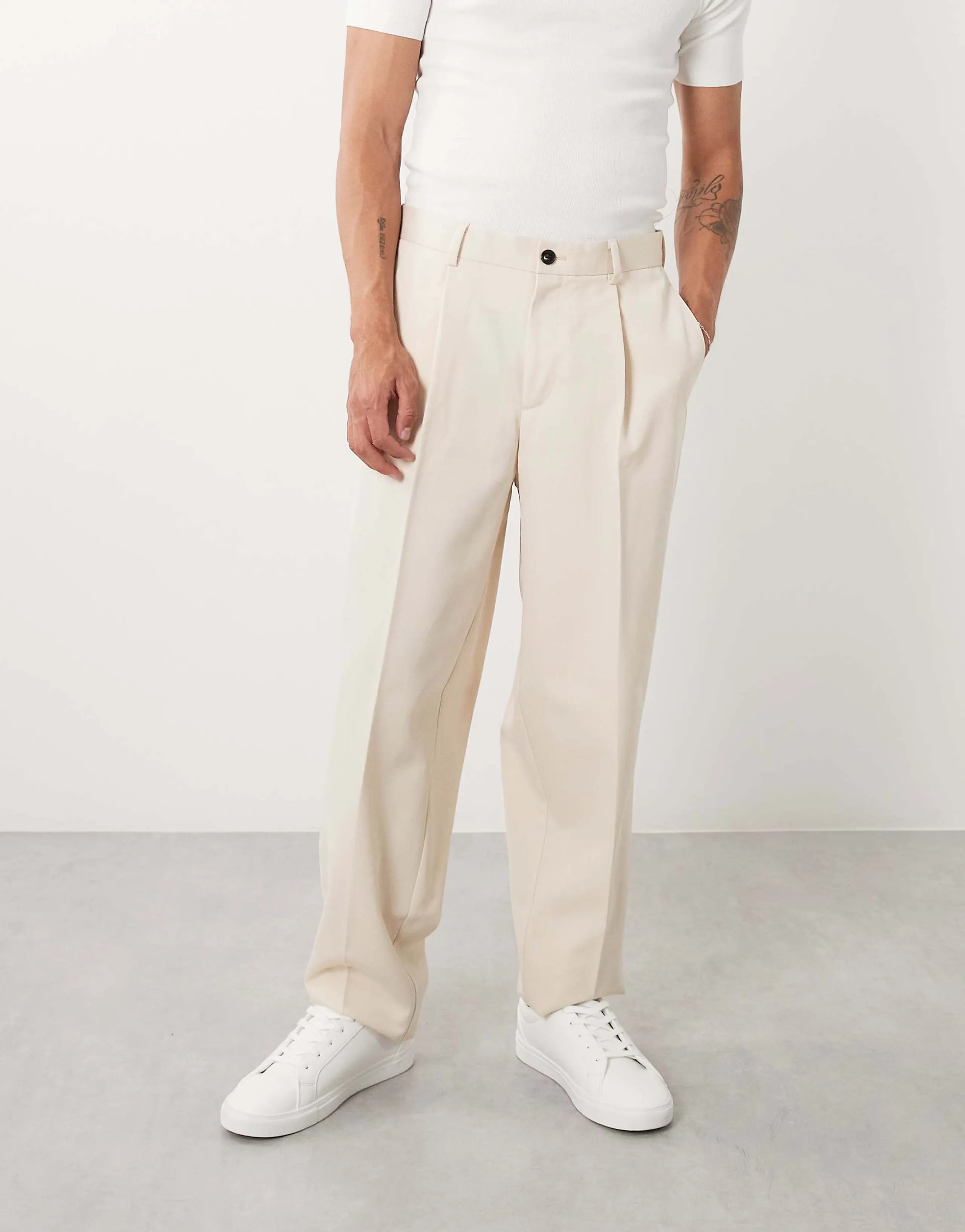 ASOS DESIGN tailored pleated oversized tapered pants in ecru