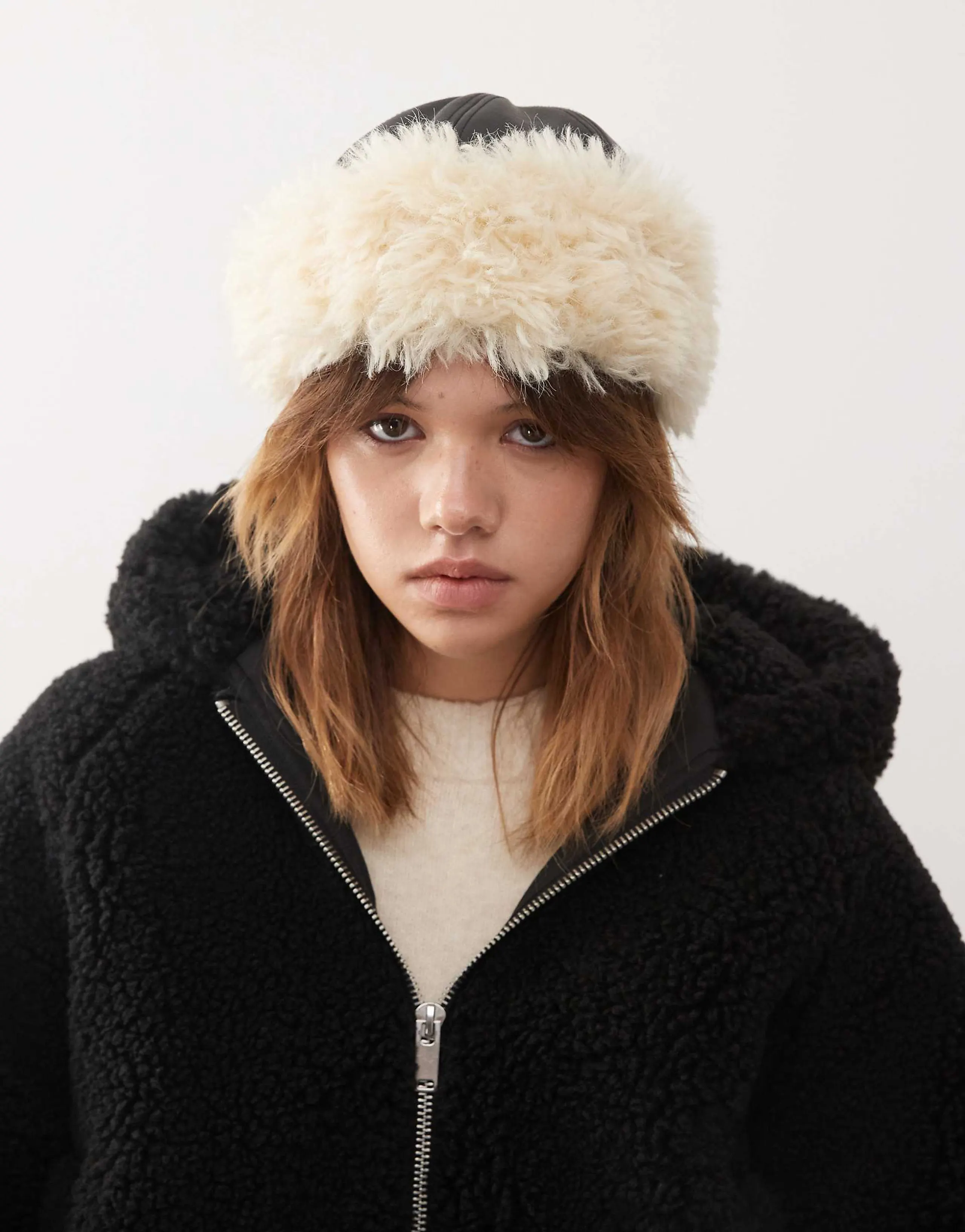 Weekday hat with faux fur trim in black & off-white