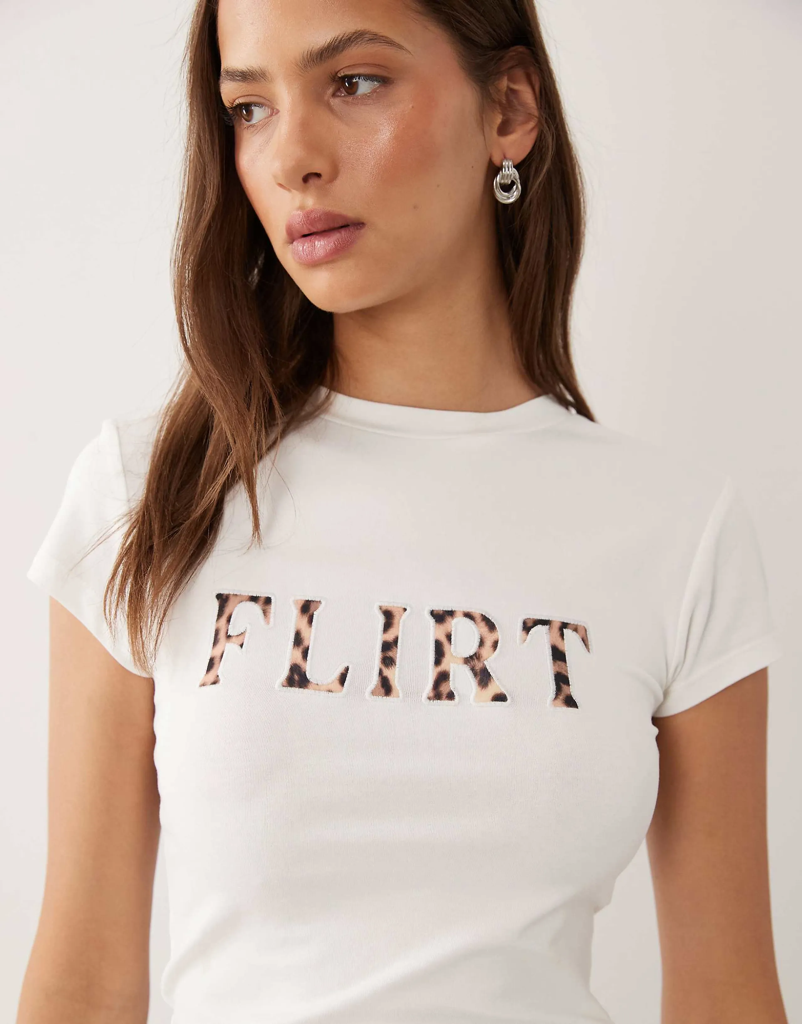 ASOS DESIGN baby tee with 'flirt' slogan in leopard and white