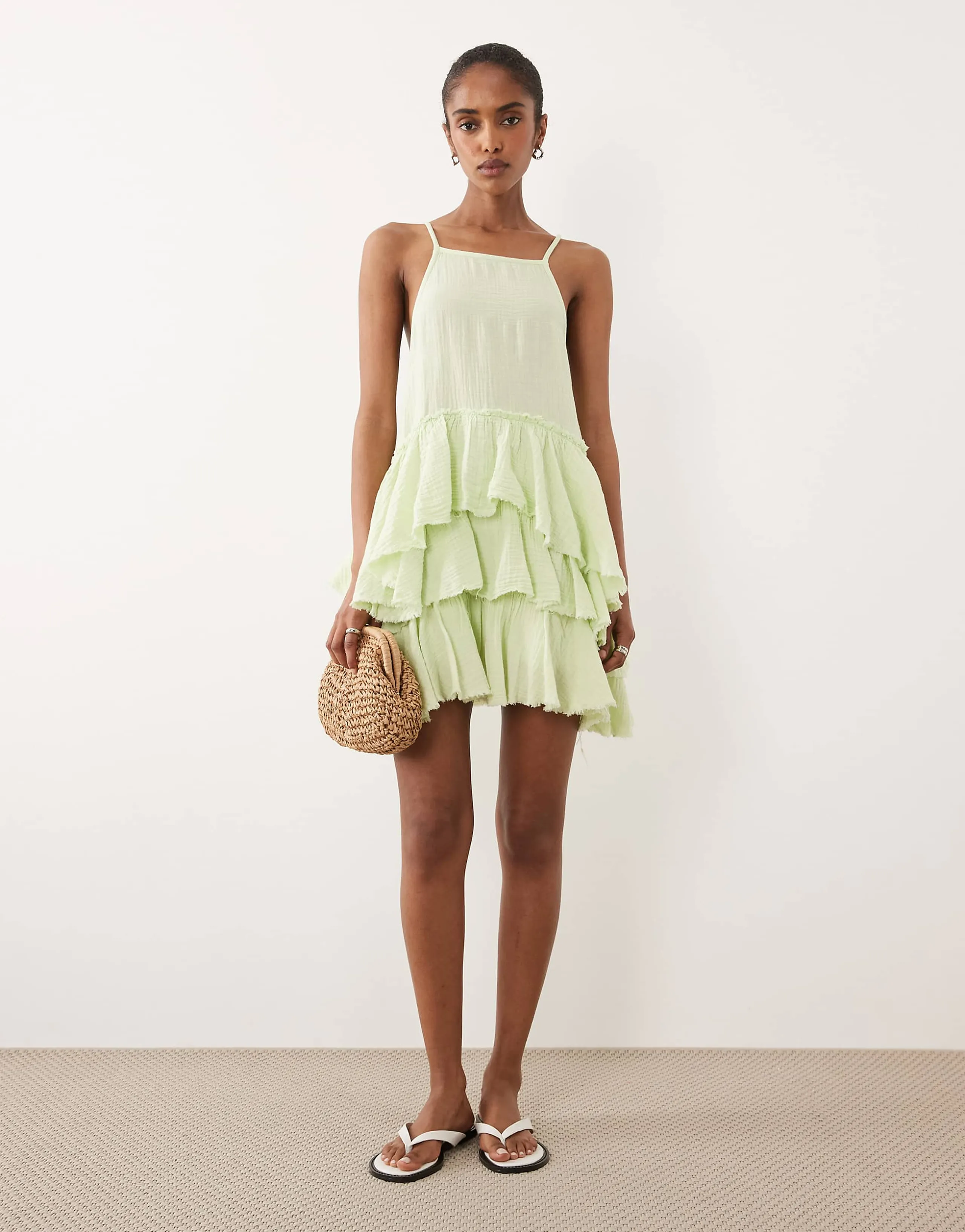 ASOS DESIGN double cloth washed mini sundress with distressed ruffles in washed lime