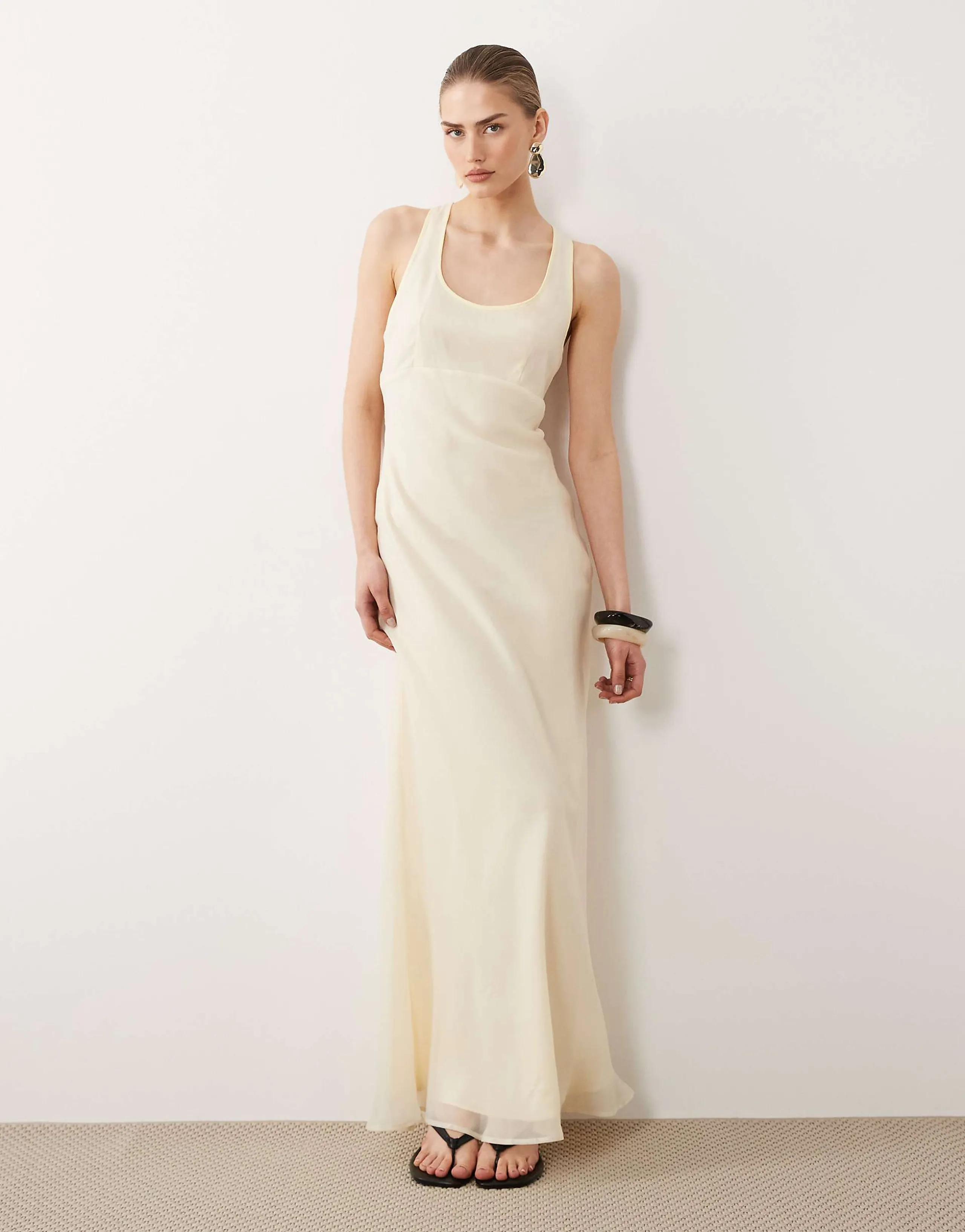ASOS DESIGN scoop neck maxi slip dress with contrast trim in pale yellow