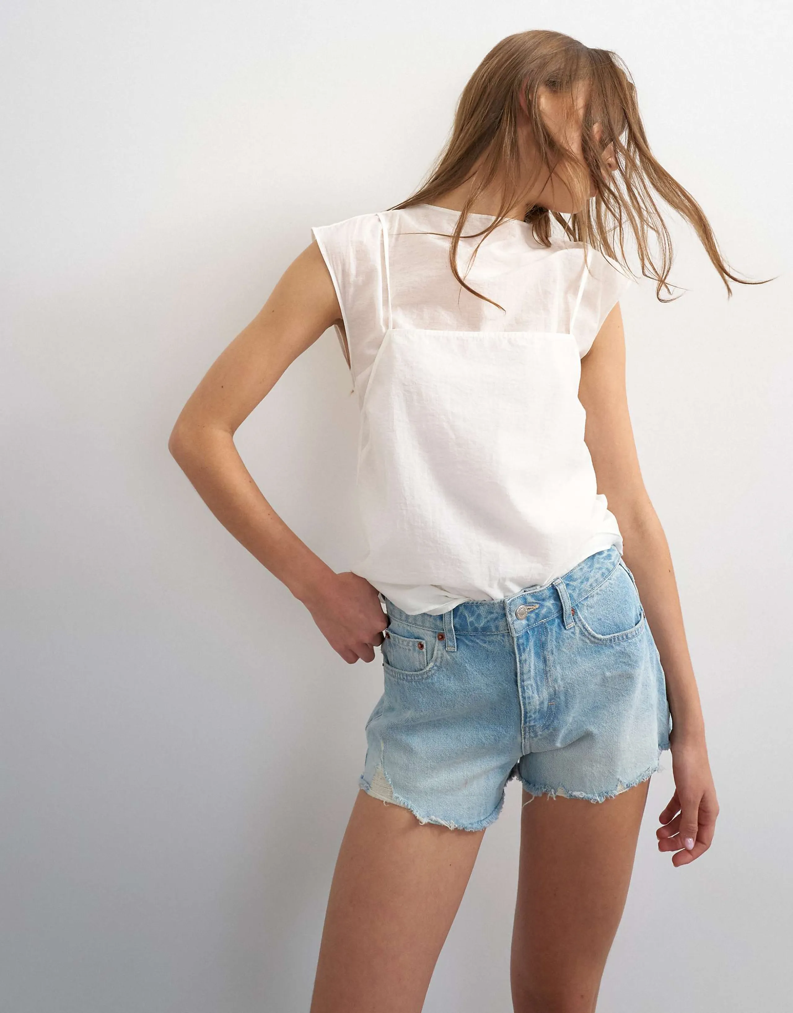 Topshop denim A-line shorts with rip in bleach