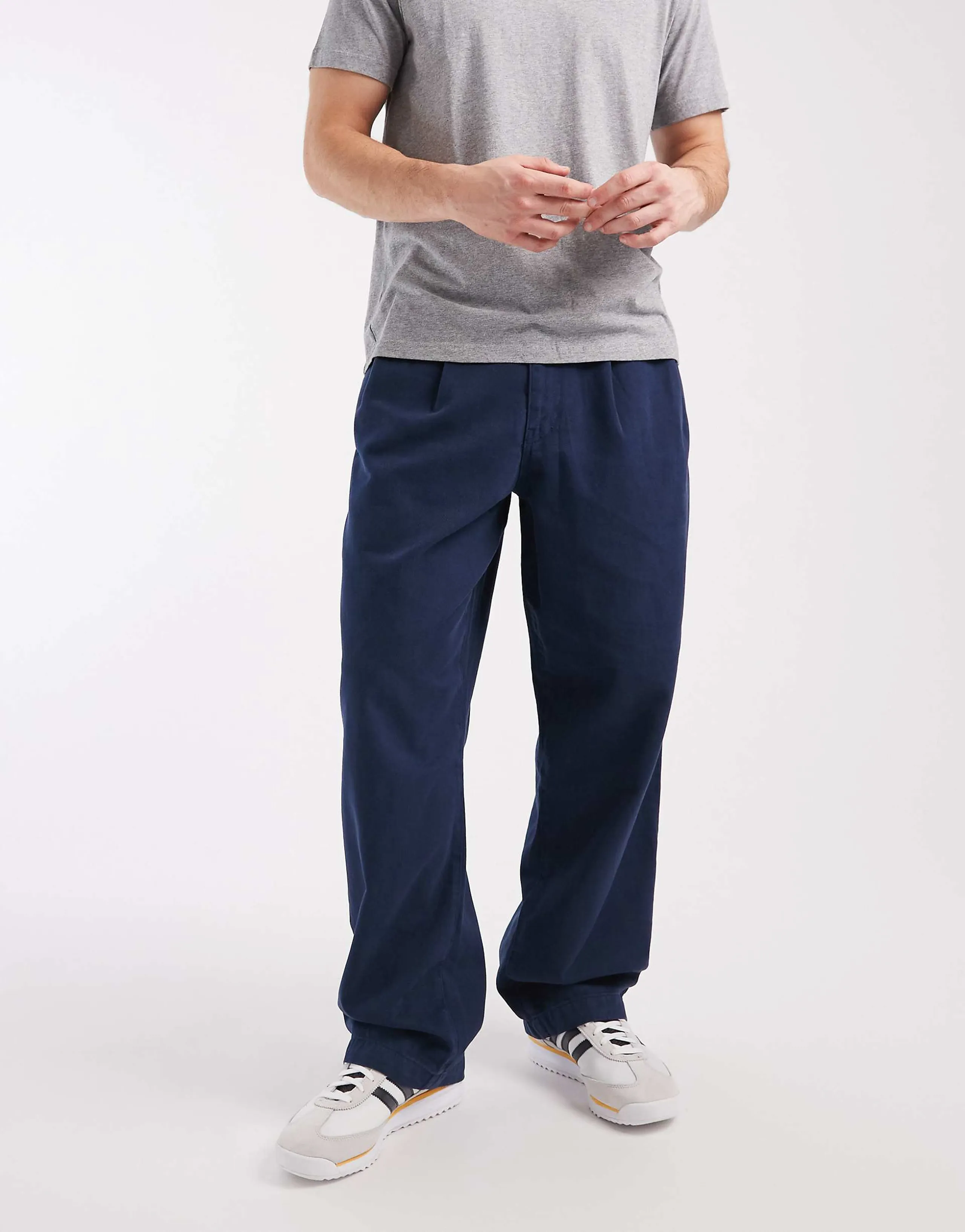 ASOS DESIGN loose pants with double pleats in navy
