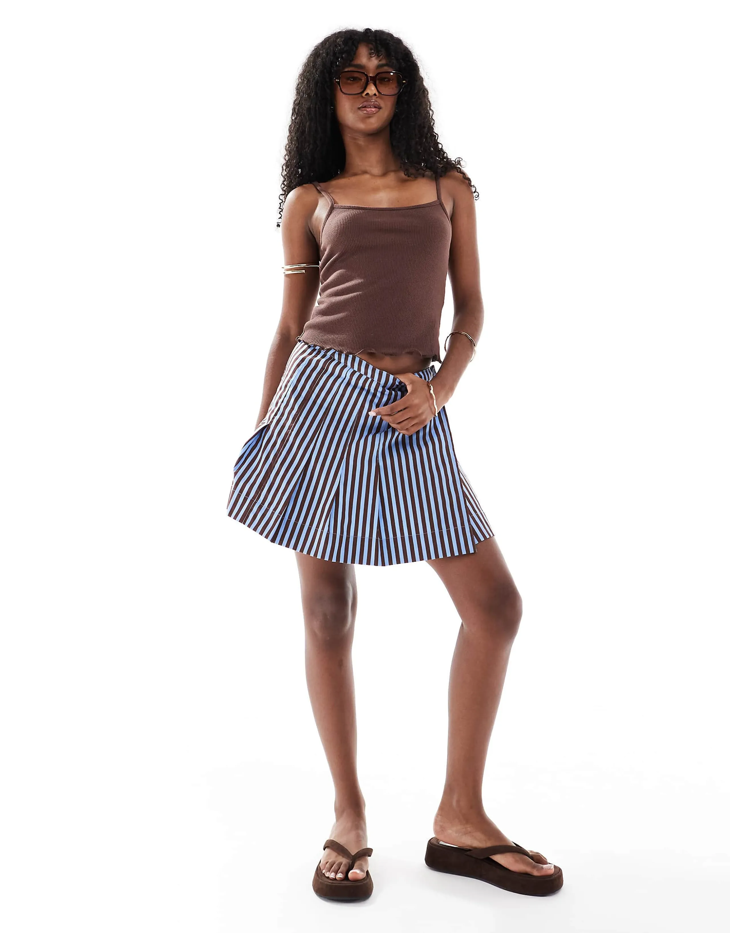 ASOS DESIGN pleat detail mini skirt in blue and brown stripe
