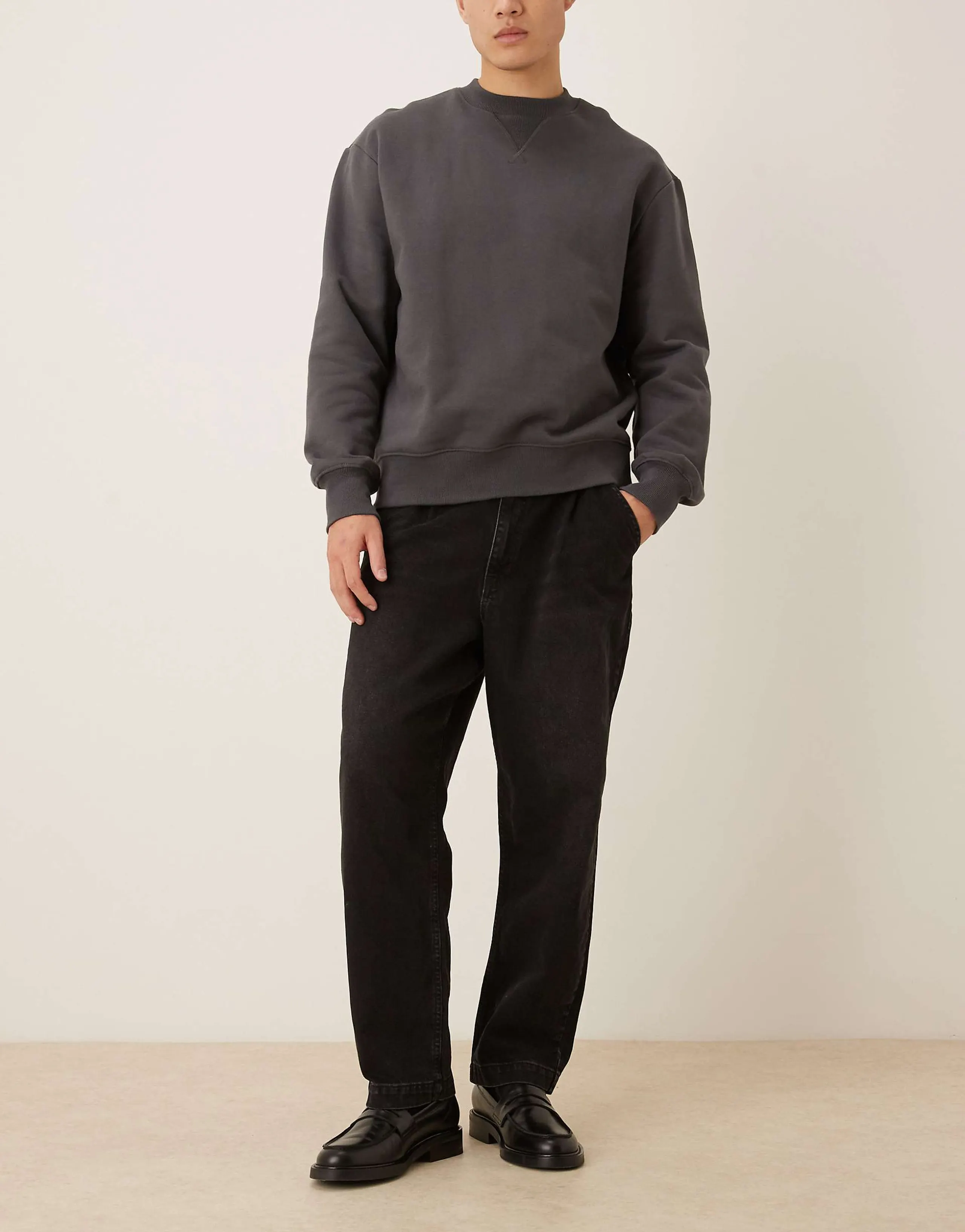 ASOS DESIGN oversized tapered jeans in black with pleats - part of a set