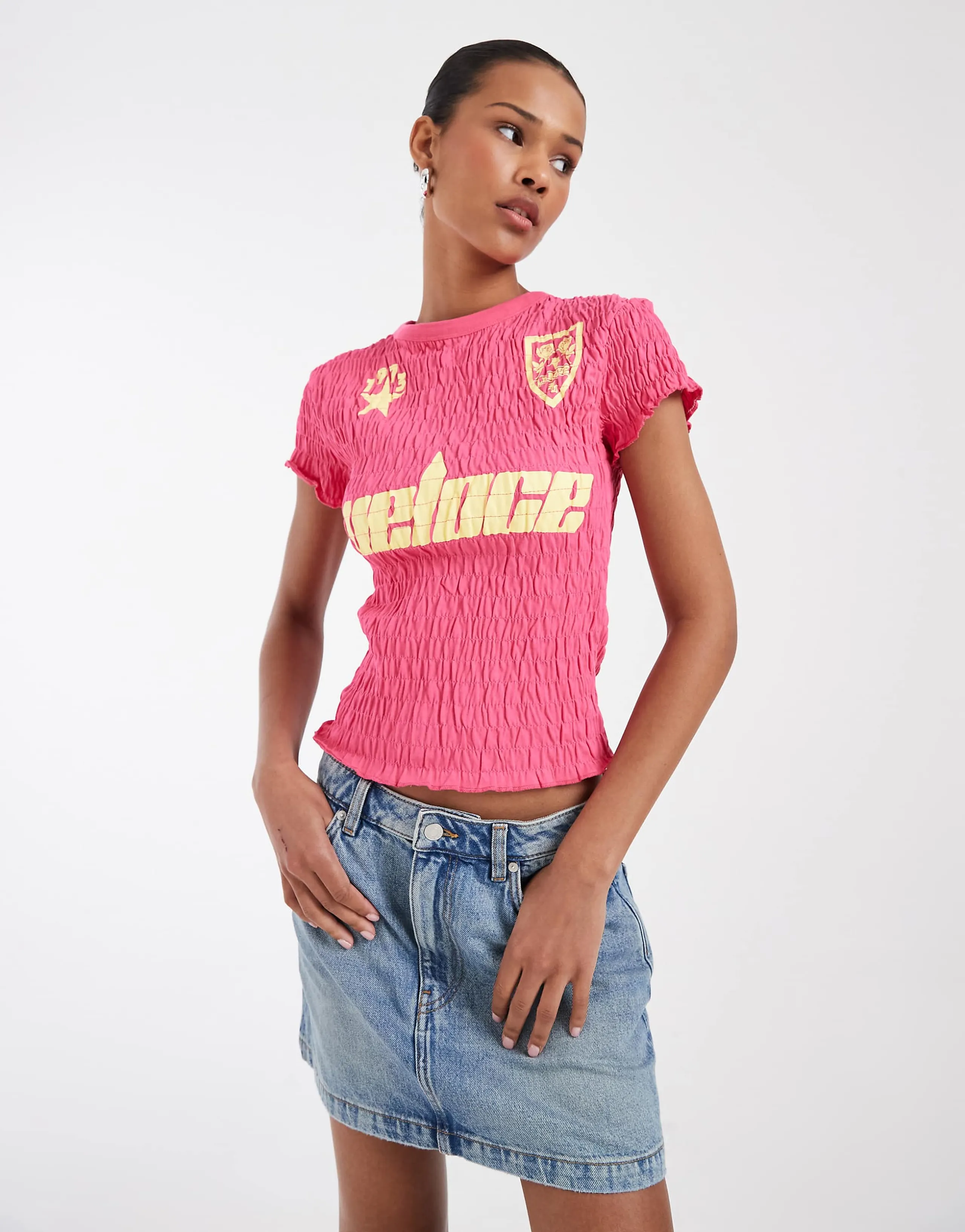 ASOS DESIGN Shirred soccer shirt in pink and yellow