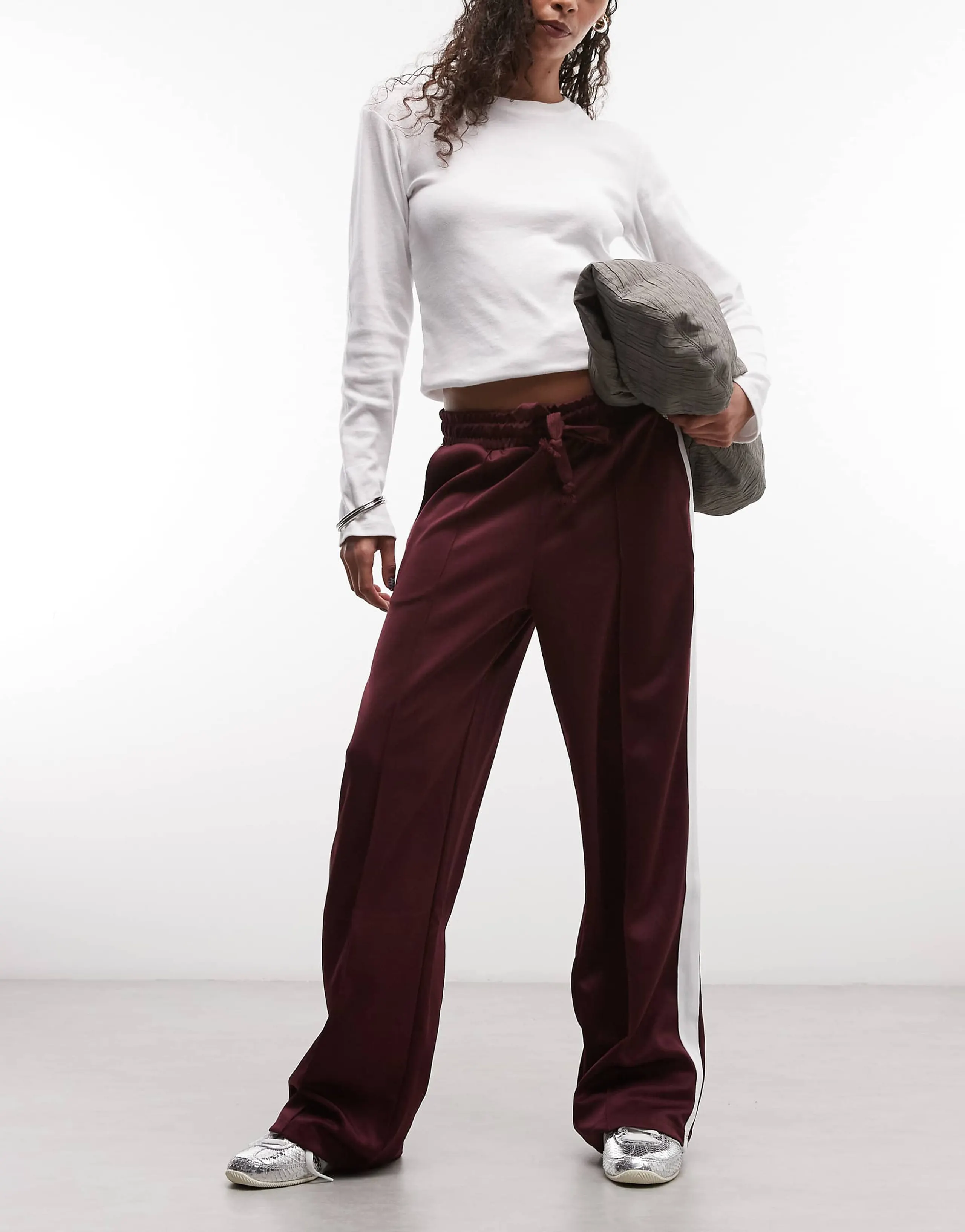 Noisy May straight leg jersey pants in burgundy with white side stripes     