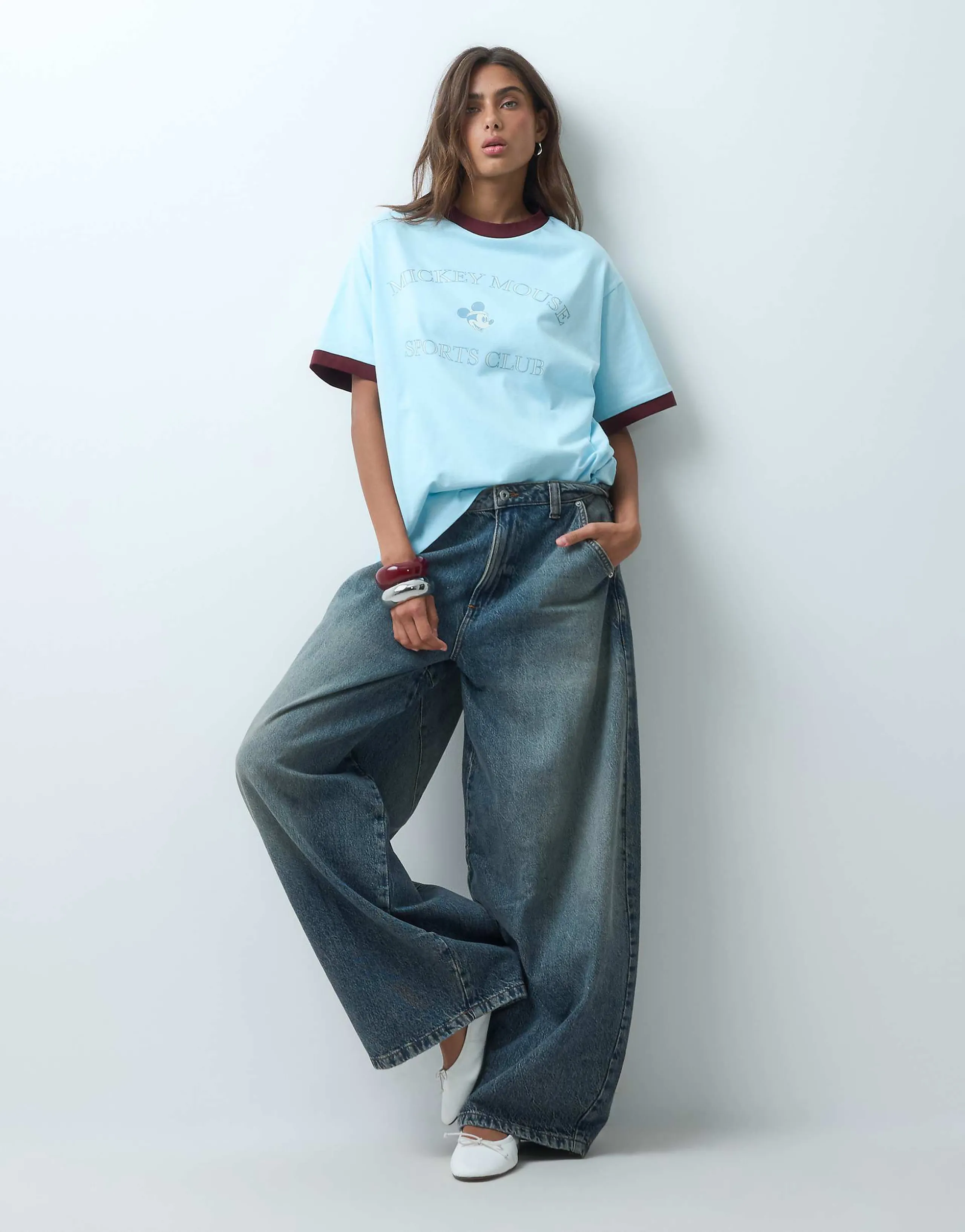 ASOS DESIGN Disney Mickey Mouse Sports Club oversized ringer t-shirt in blue