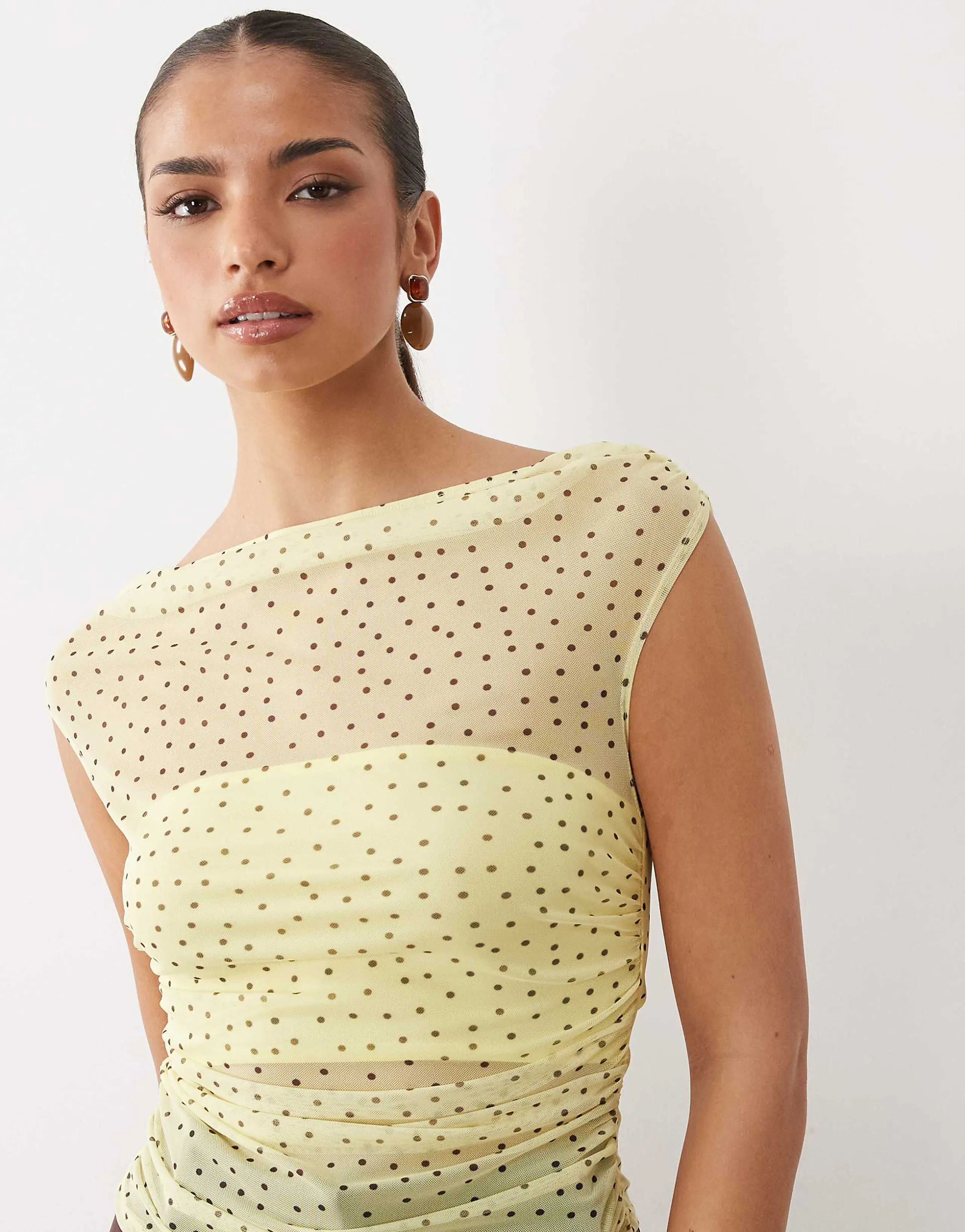 ASOS DESIGN mesh gathered short sleeve off the shoulder top in yellow and white polka dots