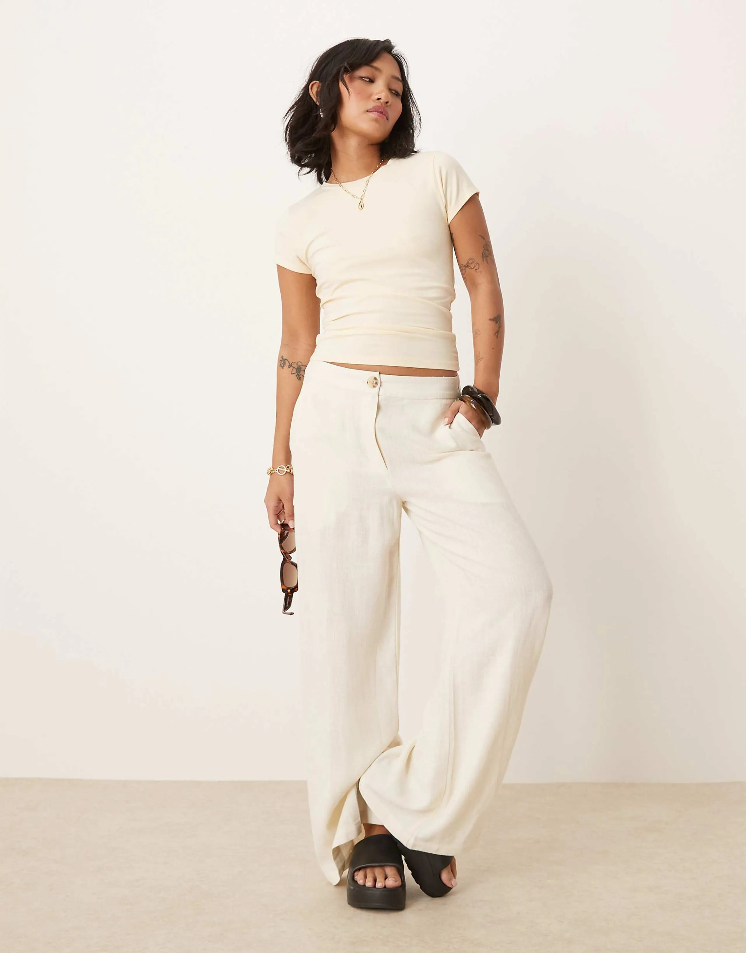 ASOS DESIGN Petite relaxed straight leg pants with linen in off-white