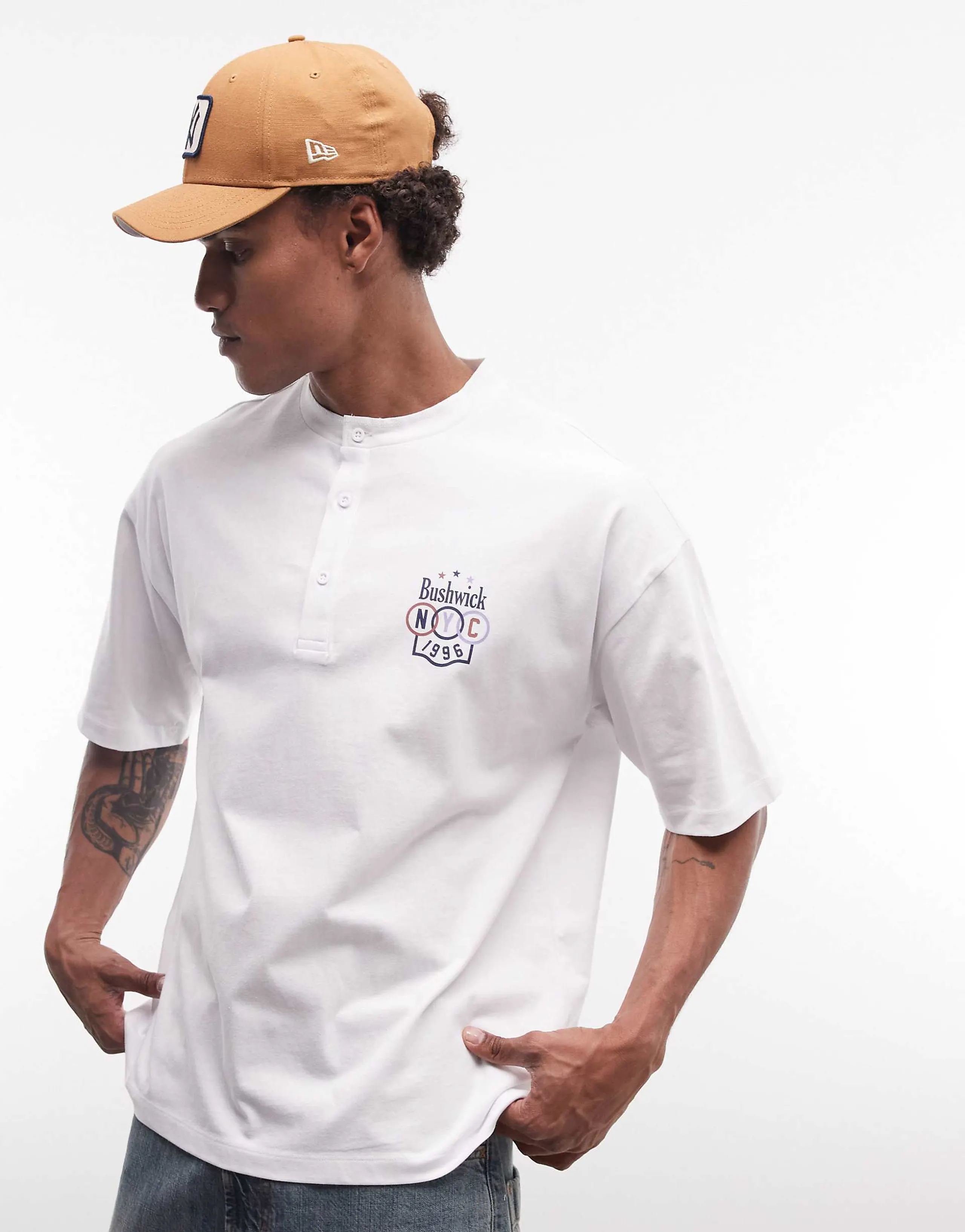 ASOS DESIGN oversized henley t-shirt with chest graphic in white