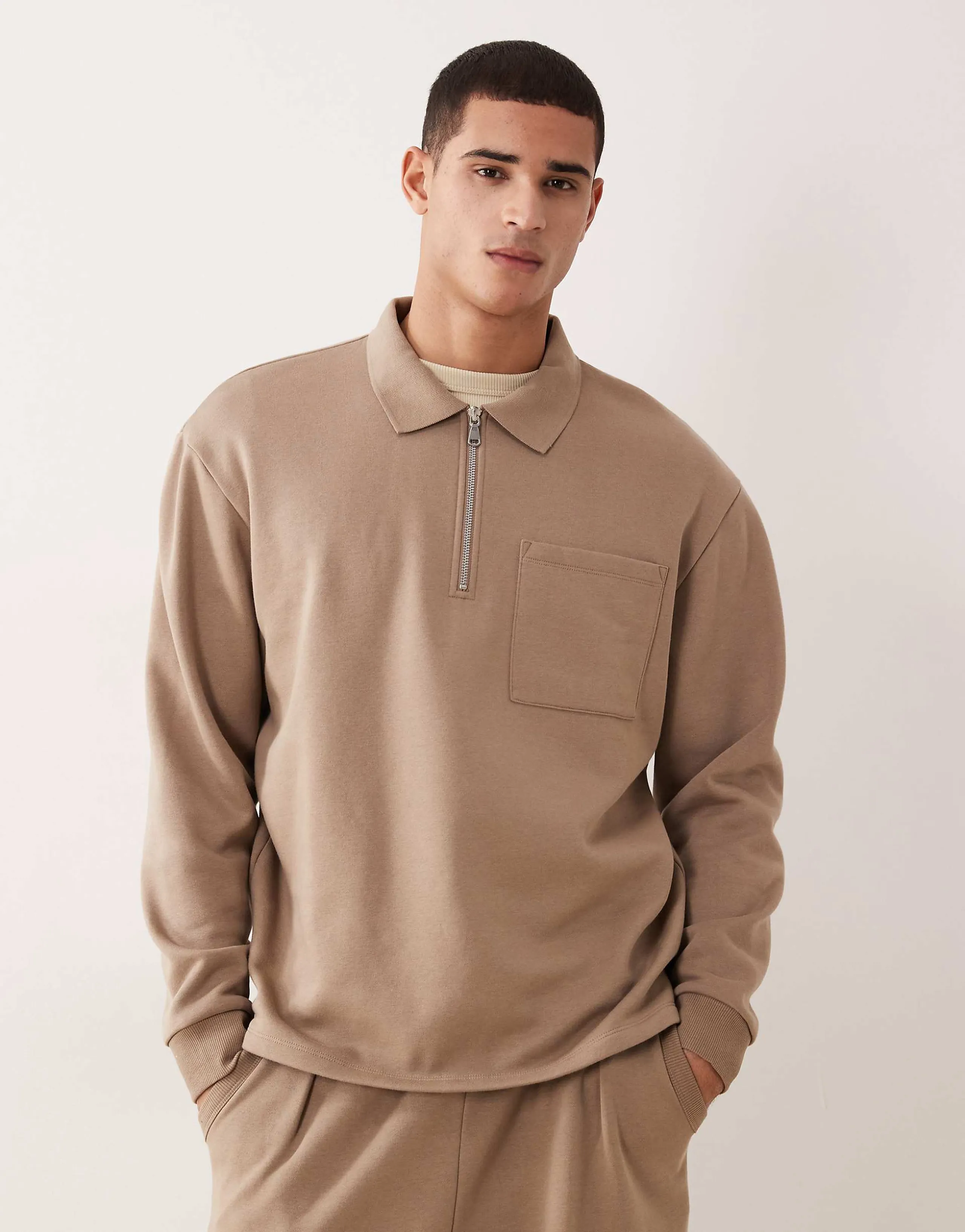 ASOS DESIGN oversized quarter zip sweatshirt with ribbed collar in beige