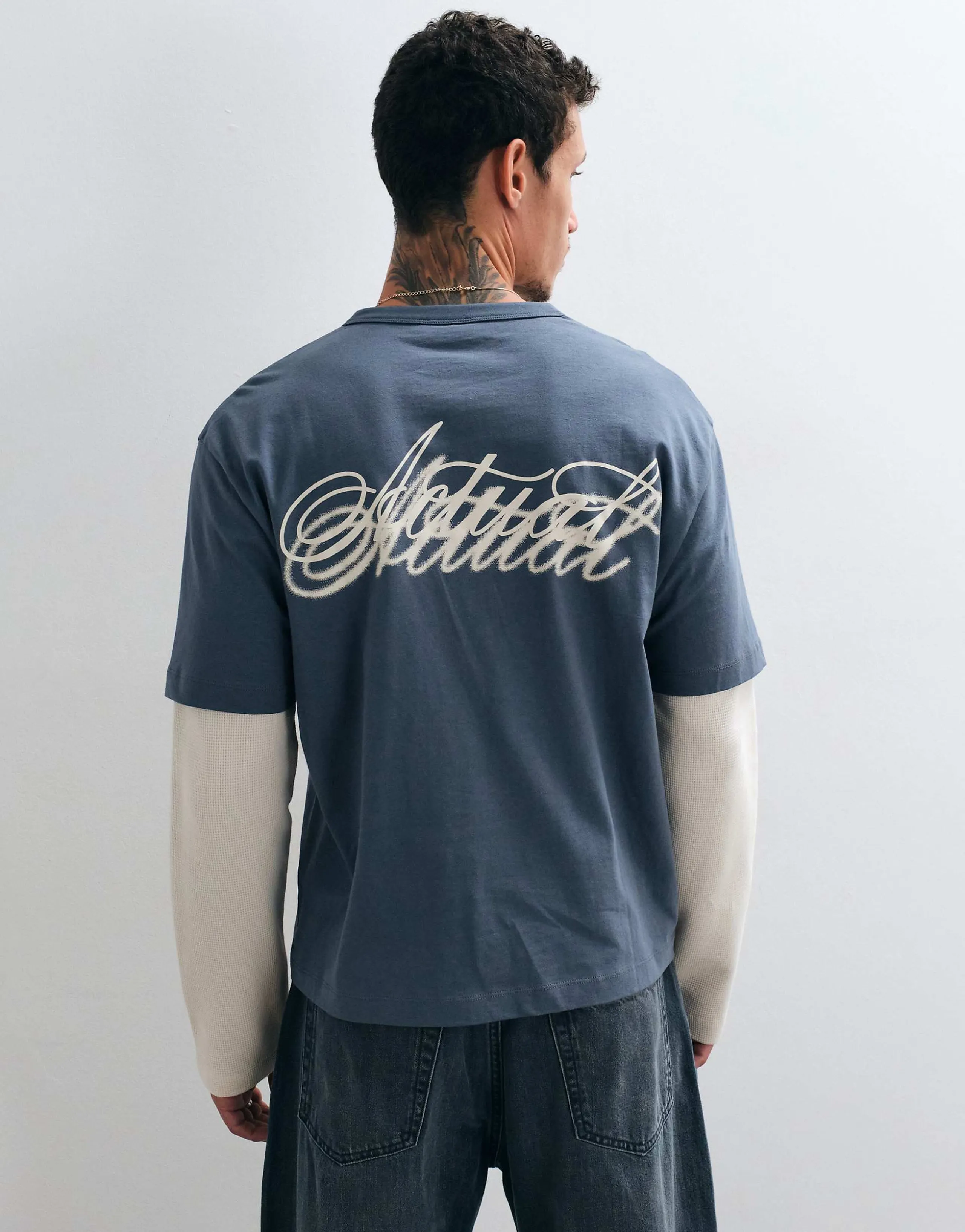 ASOS DESIGN boxy relaxed double layer Henley T-shirt with script graphic in gray