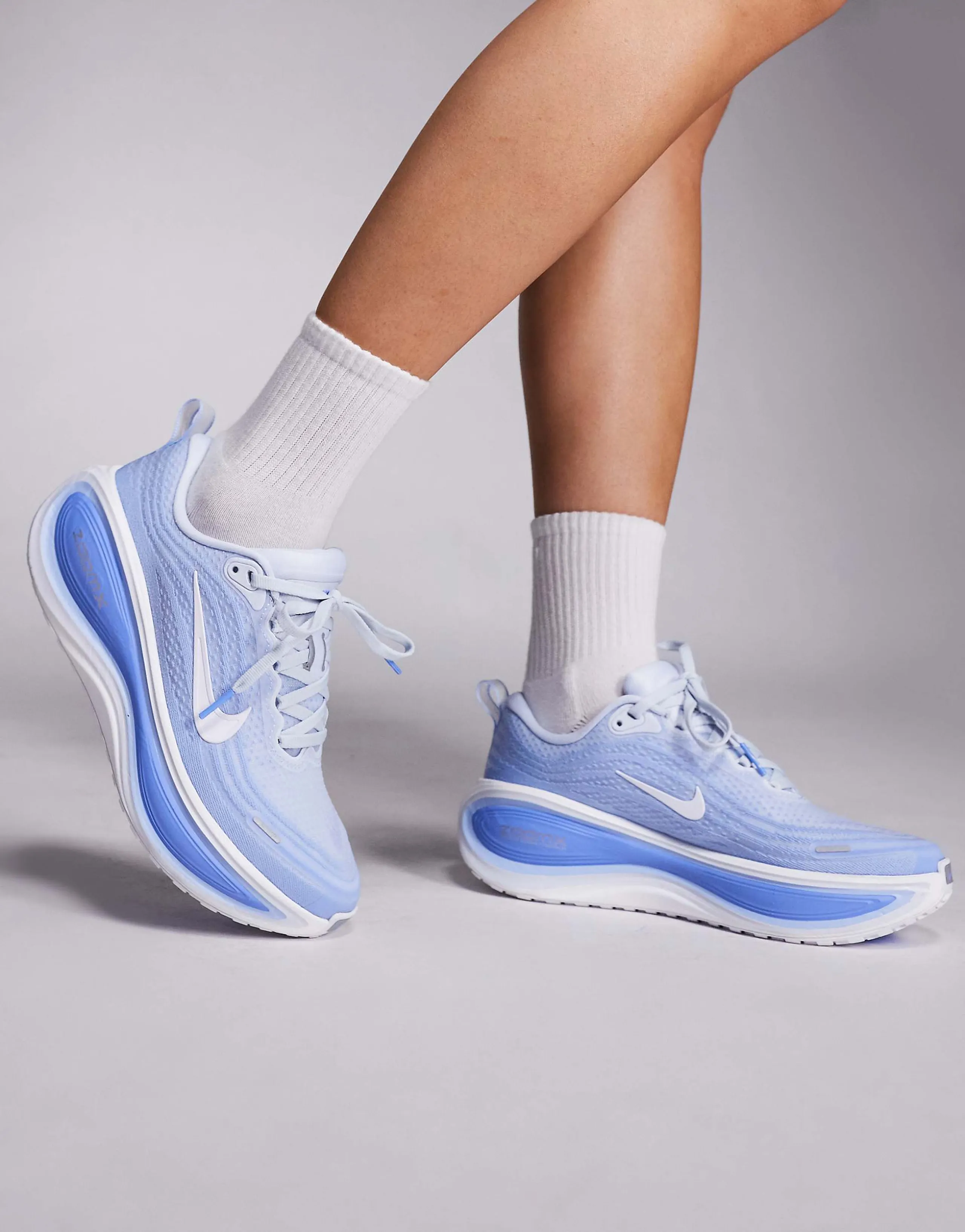 Nike Running Vomero Plus sneakers in blue