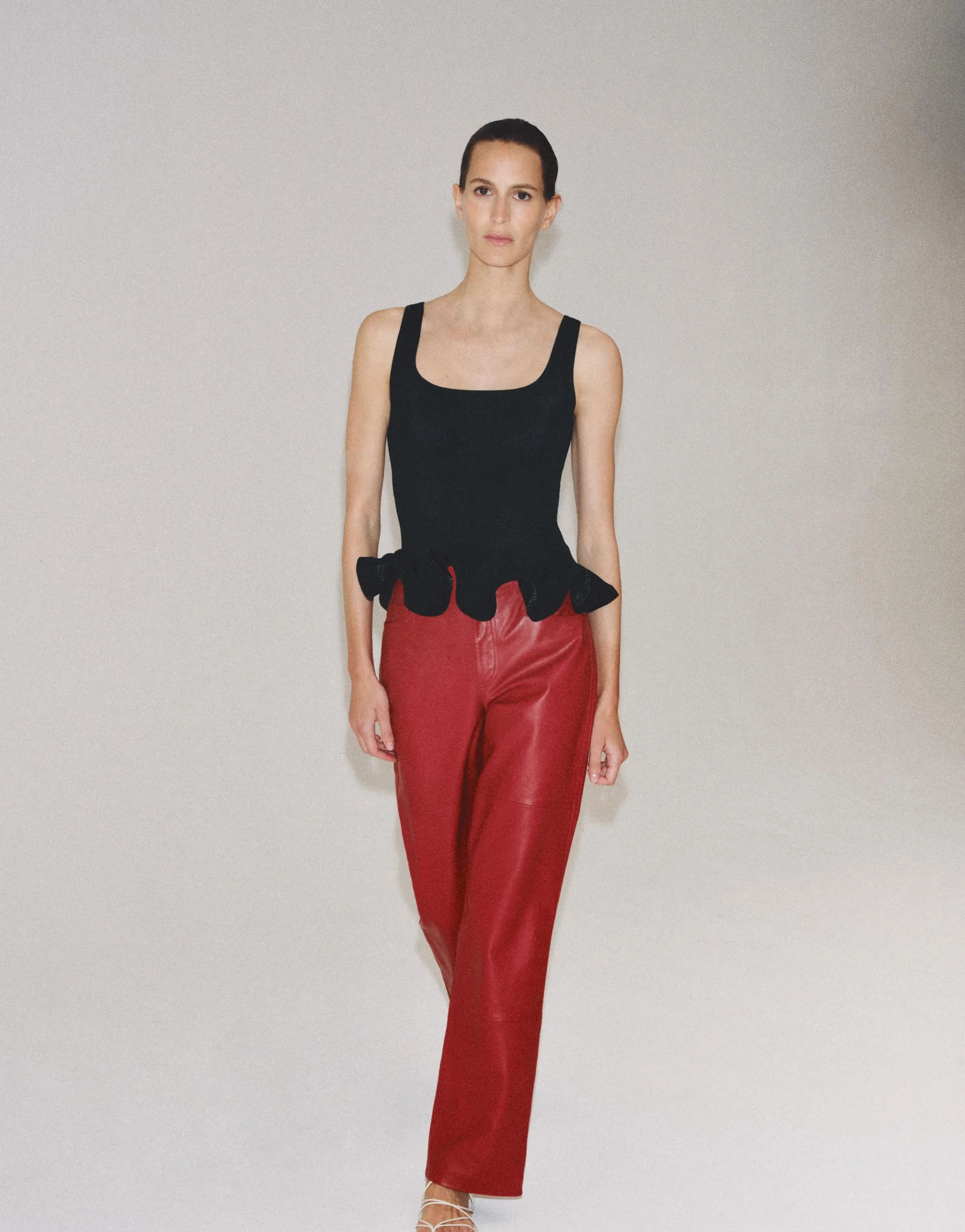 KNIT TOP WITH WAVY HEM