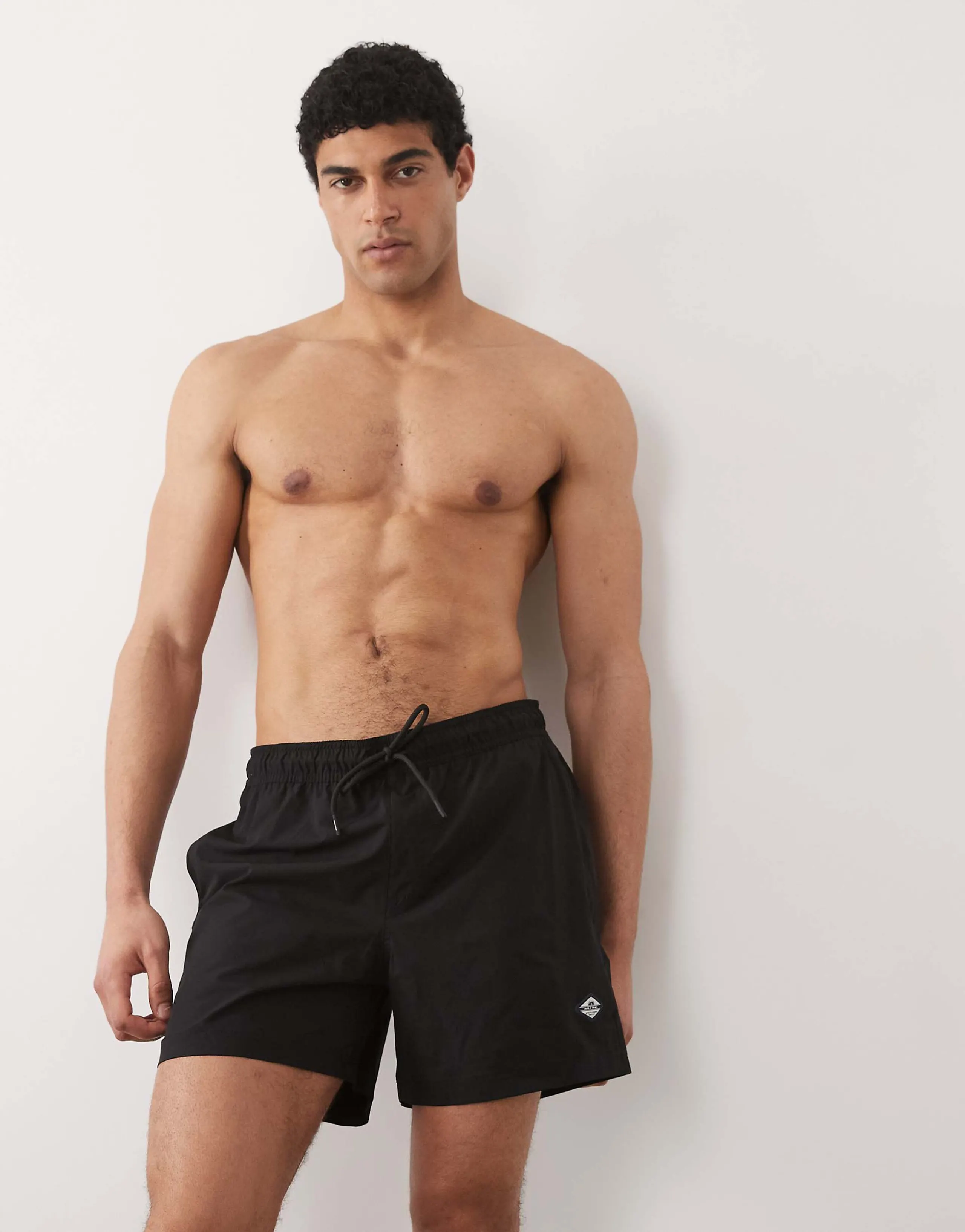 Jack & Jones logo swim shorts in black
