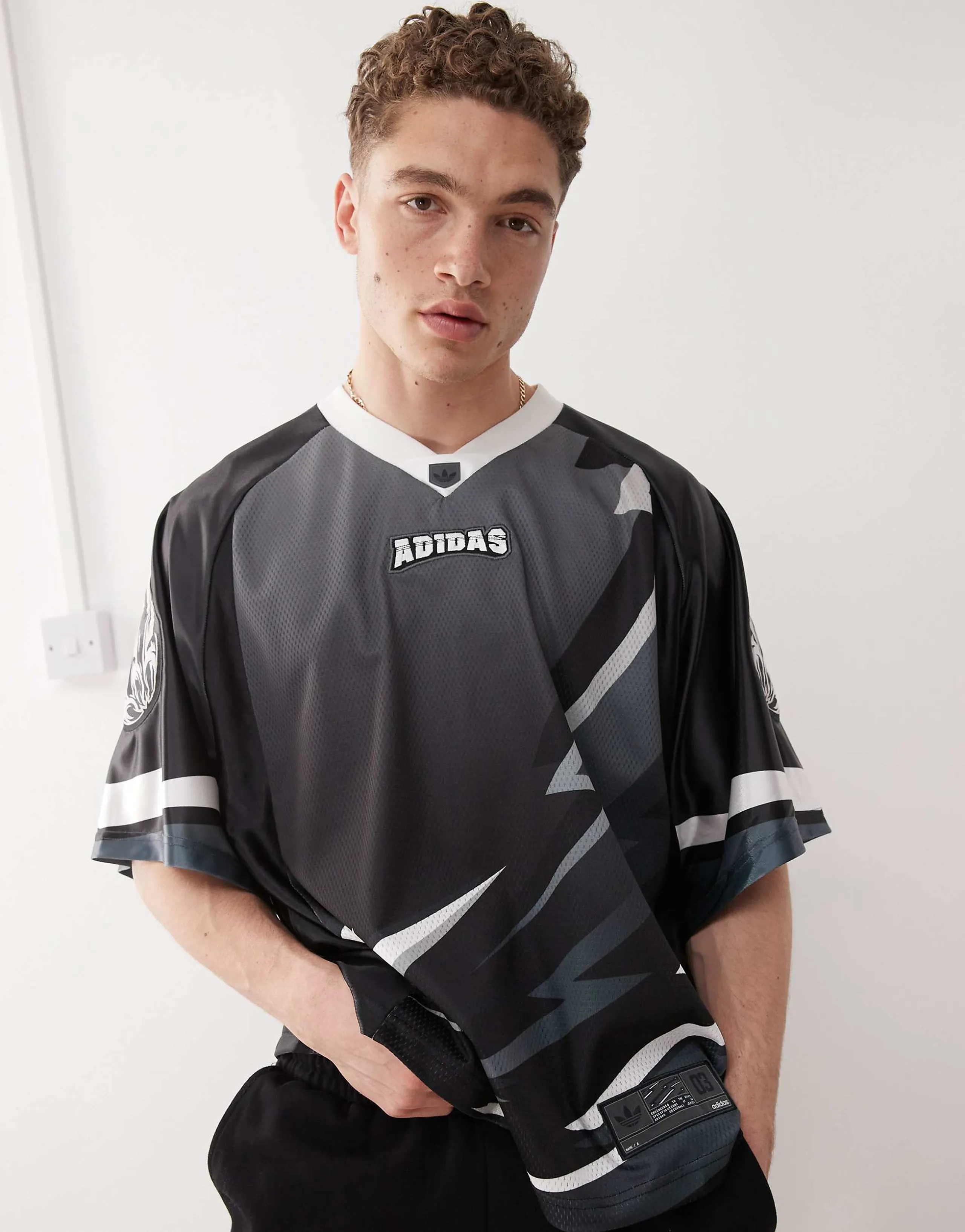 adidas Originals Adilenium Season 3 Team Jersey in black
