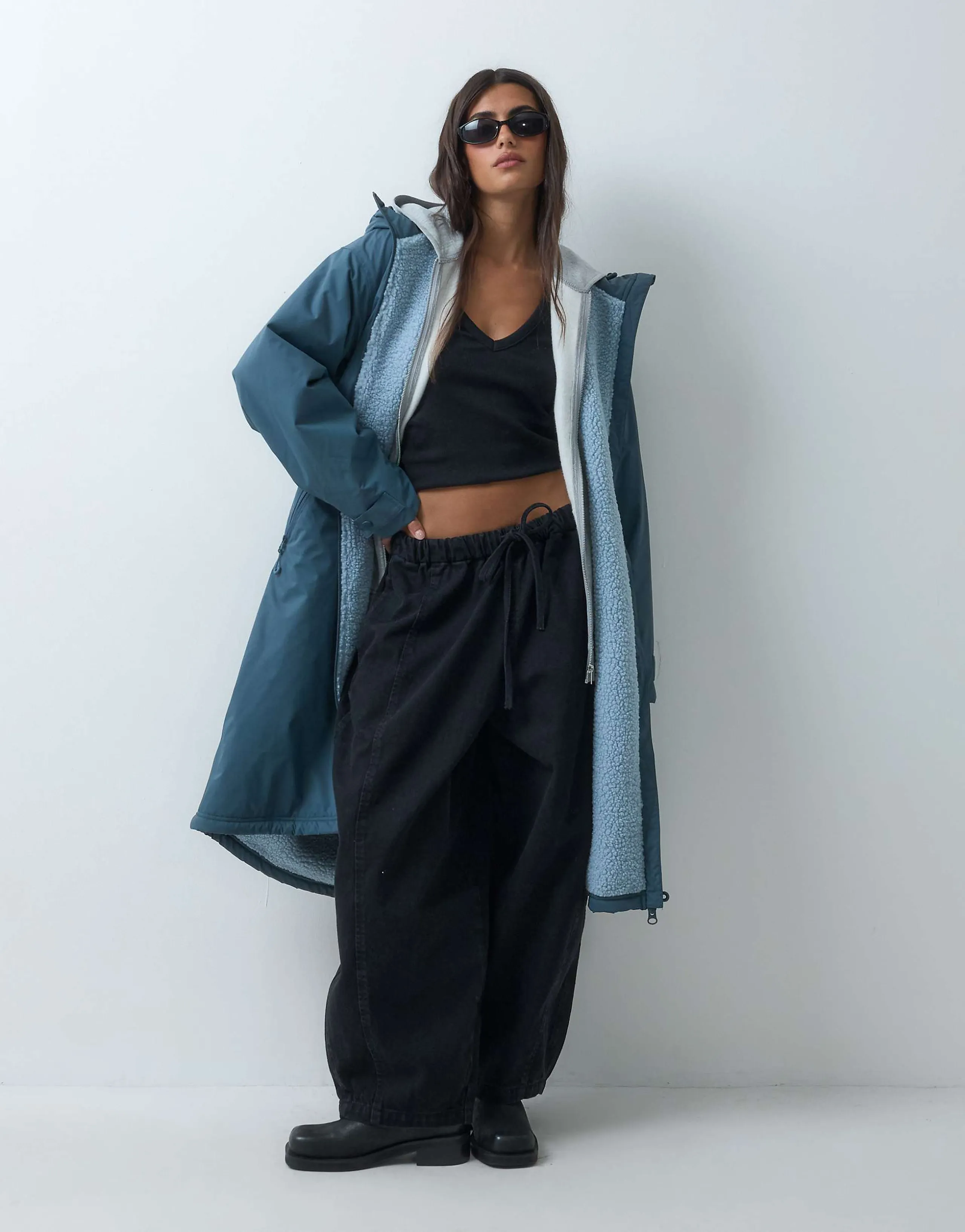 ASOS DESIGN longline rain coat in teal with blue borg liner