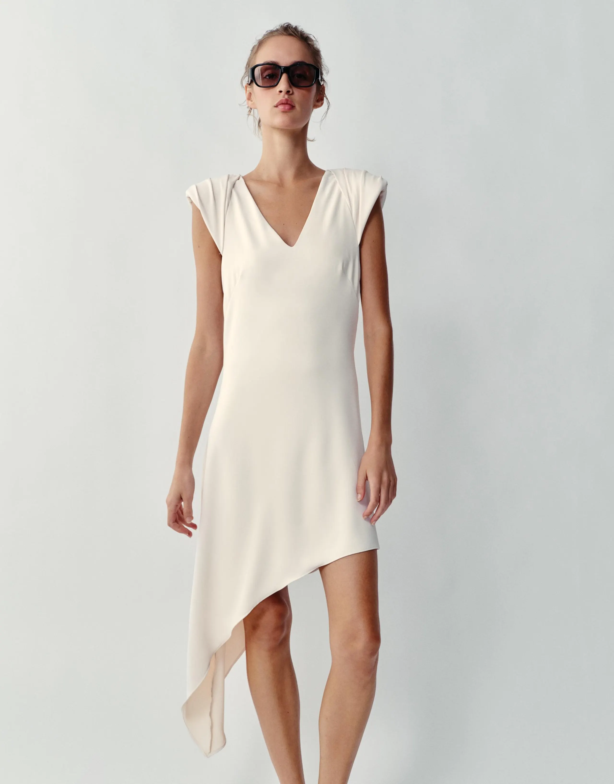 ASYMMETRIC SHORT DRESS WITH SHOULDER PADS