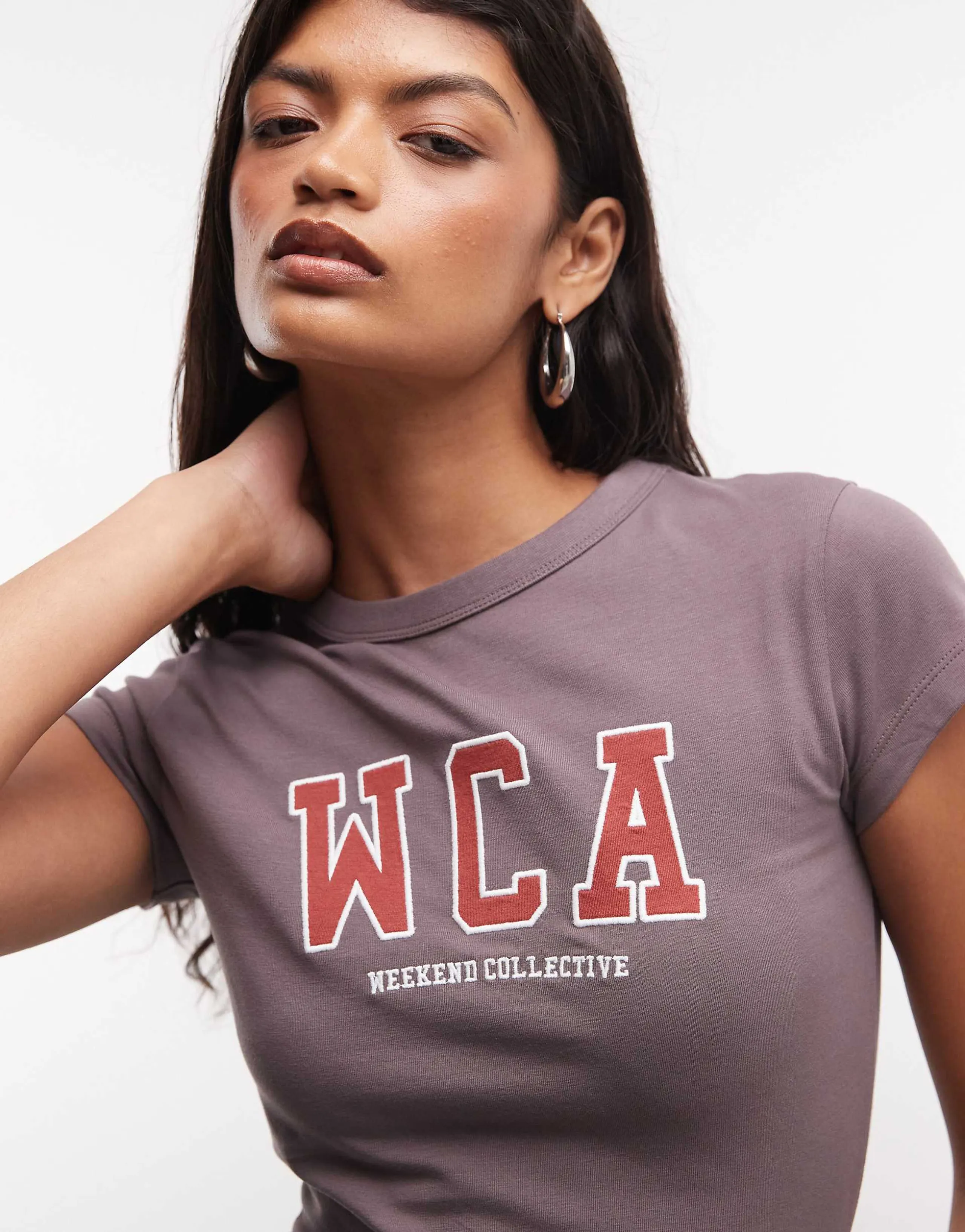 Weekend Collective Icon baby tee with WCA graphic in gray