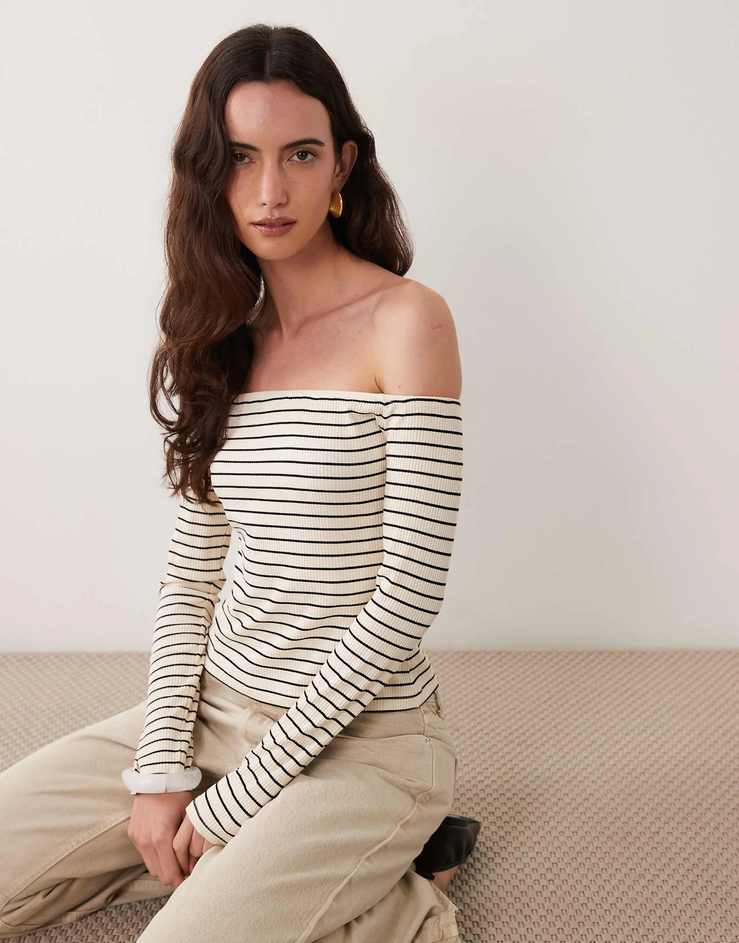 ASOS DESIGN off the shoulder long sleeve top in black and ecru stripes