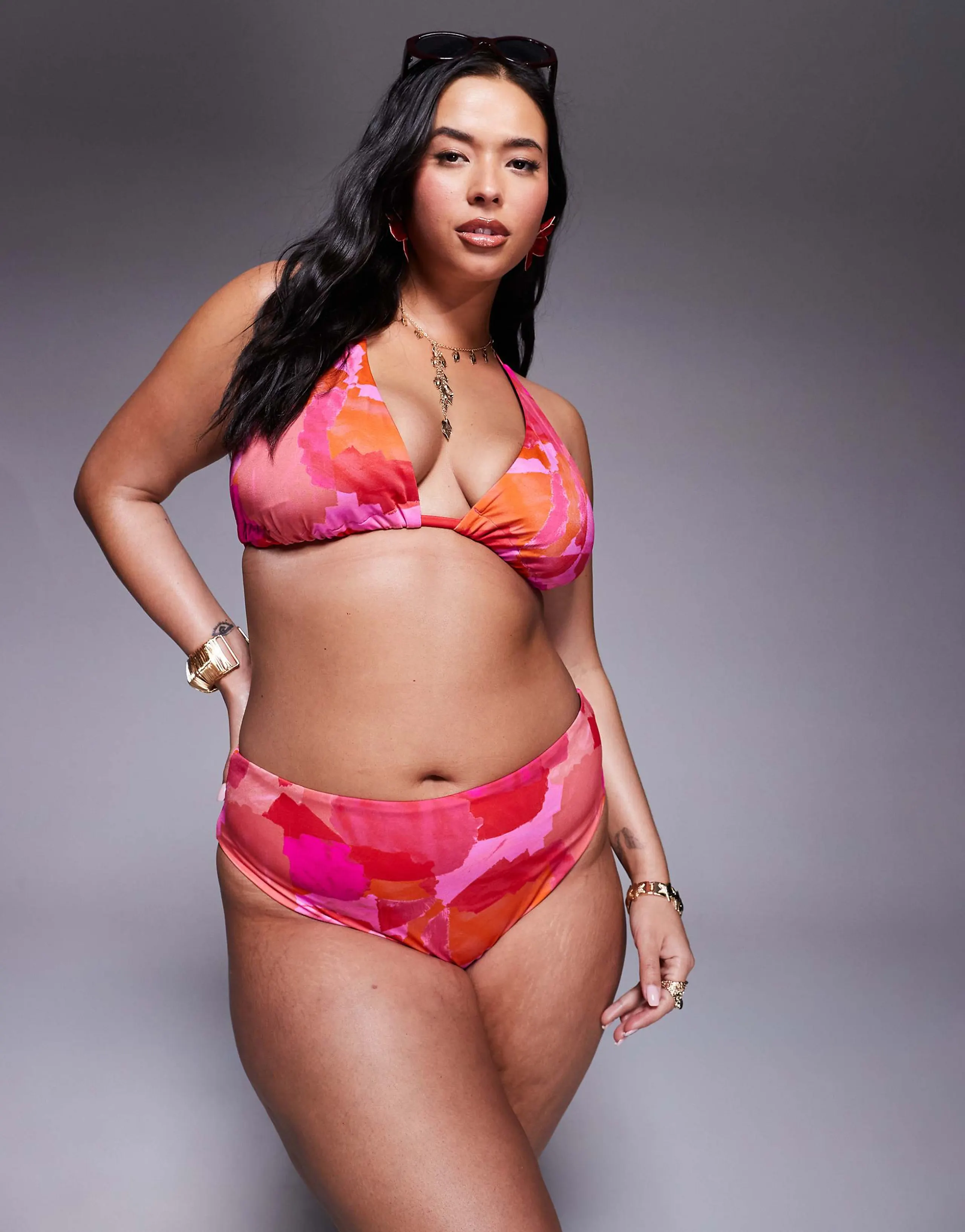 ASOS DESIGN Curve Exclusive Arina high leg high waist bikini bottoms in pink & red abstract print