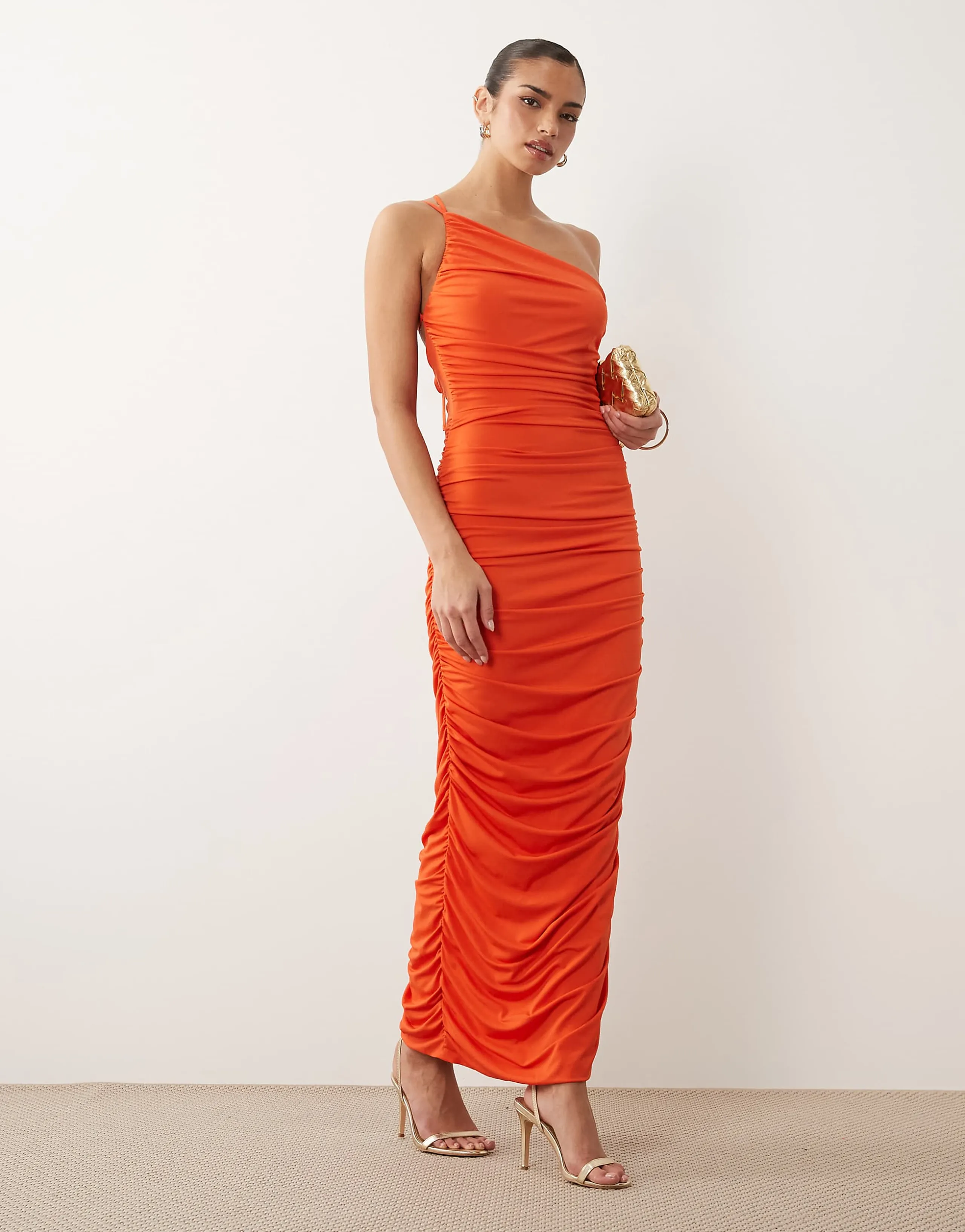 TFNC slinky one shoulder ruched open back maxi dress in orange