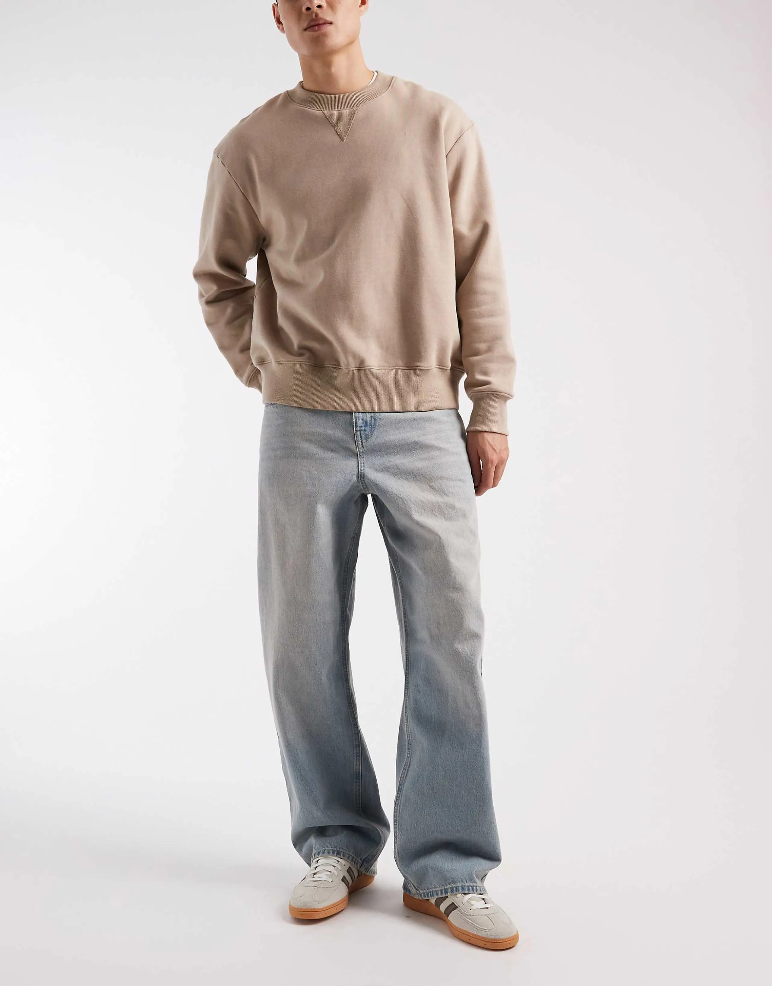 ASOS DESIGN baggy jeans in light wash blue with tint