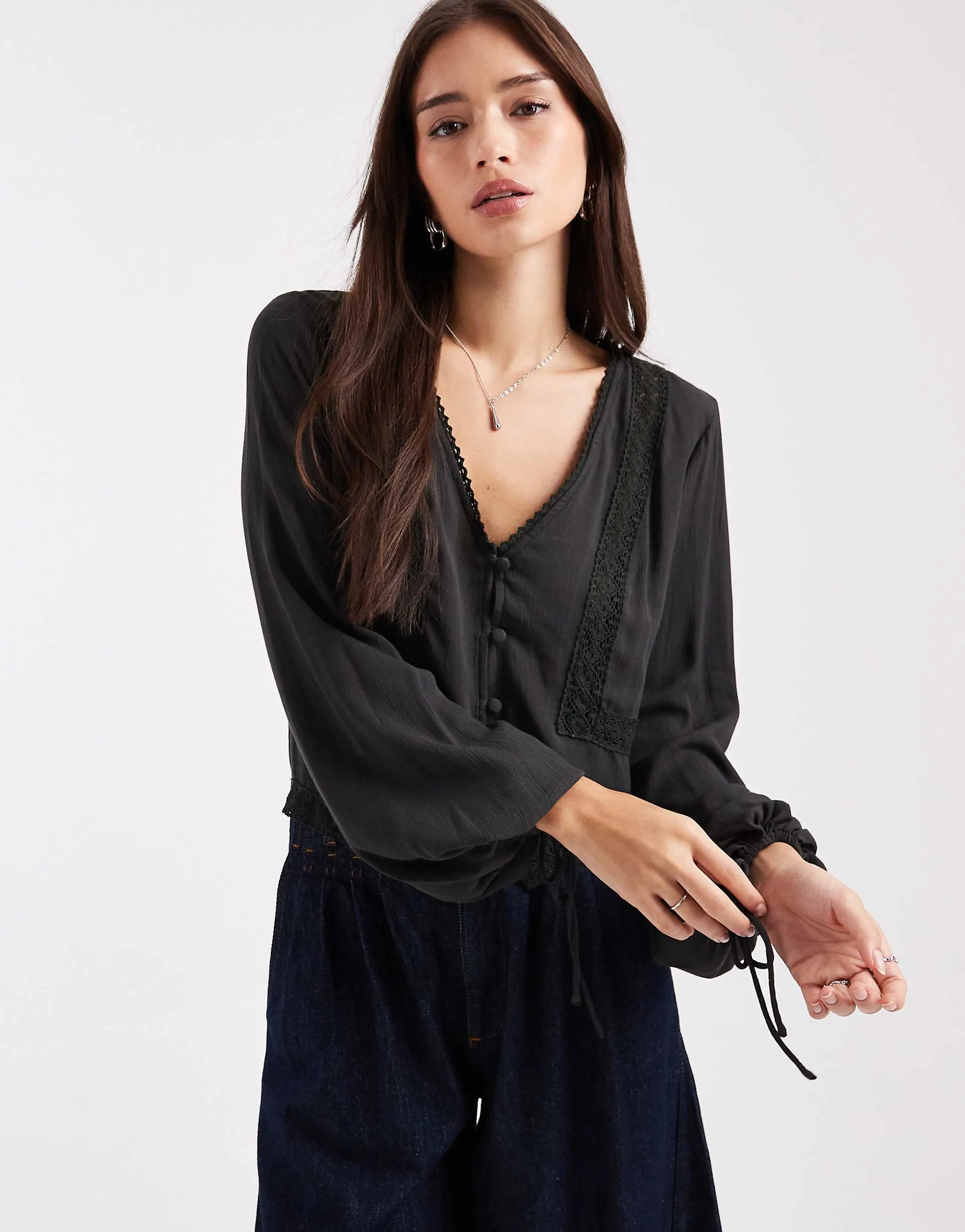 ASOS DESIGN textured long sleeve lace inserts blouse in black