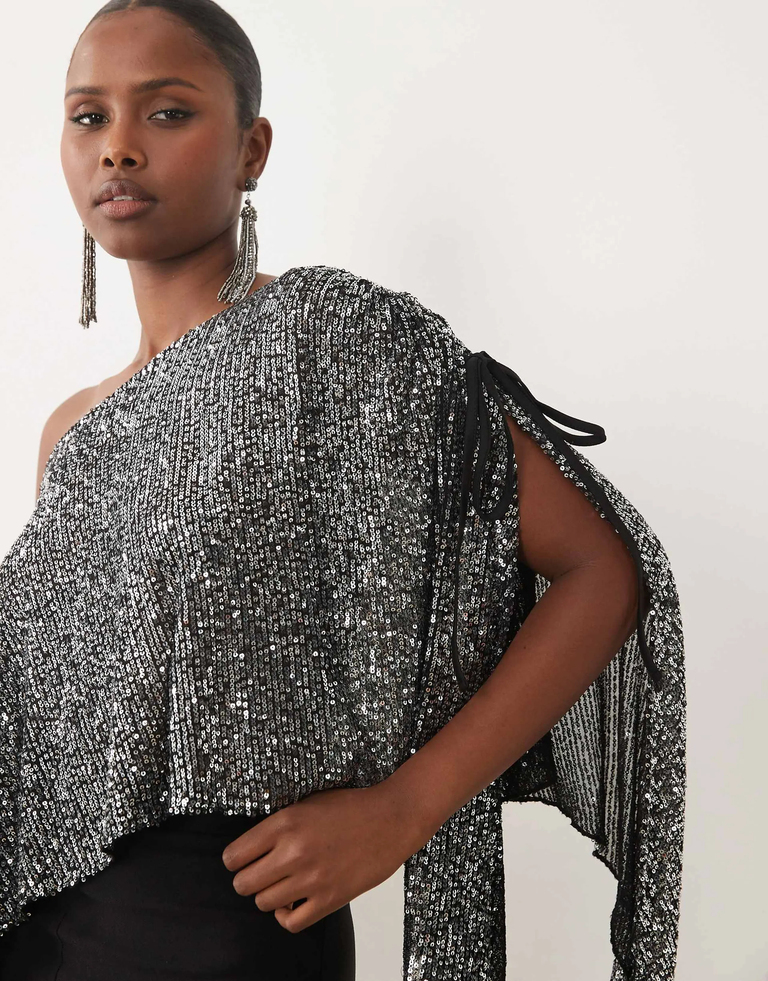ASOS DESIGN sequin asymmetrical off the shoulder cape sleeve top in silver