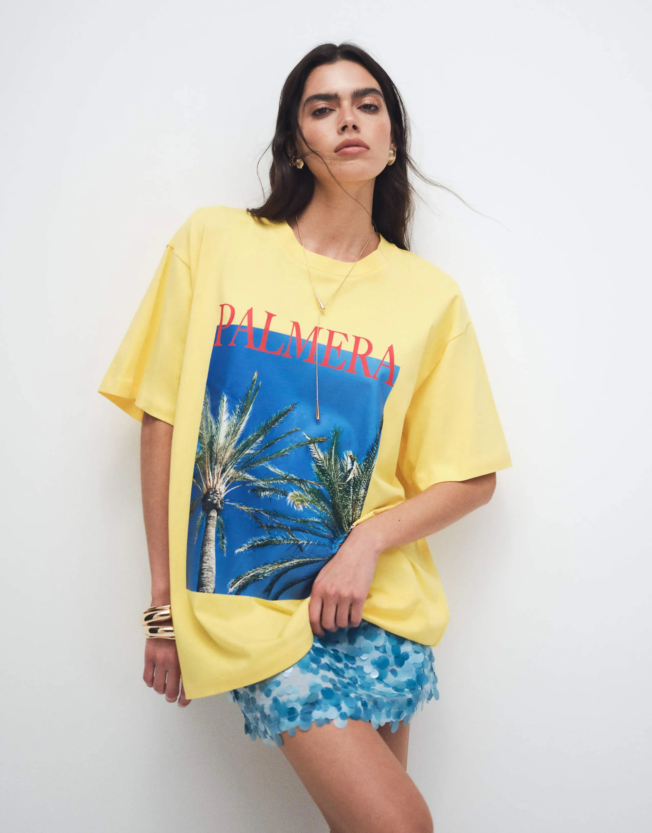 ASOS DESIGN oversized T-shirt with Palmera graphic in yellow