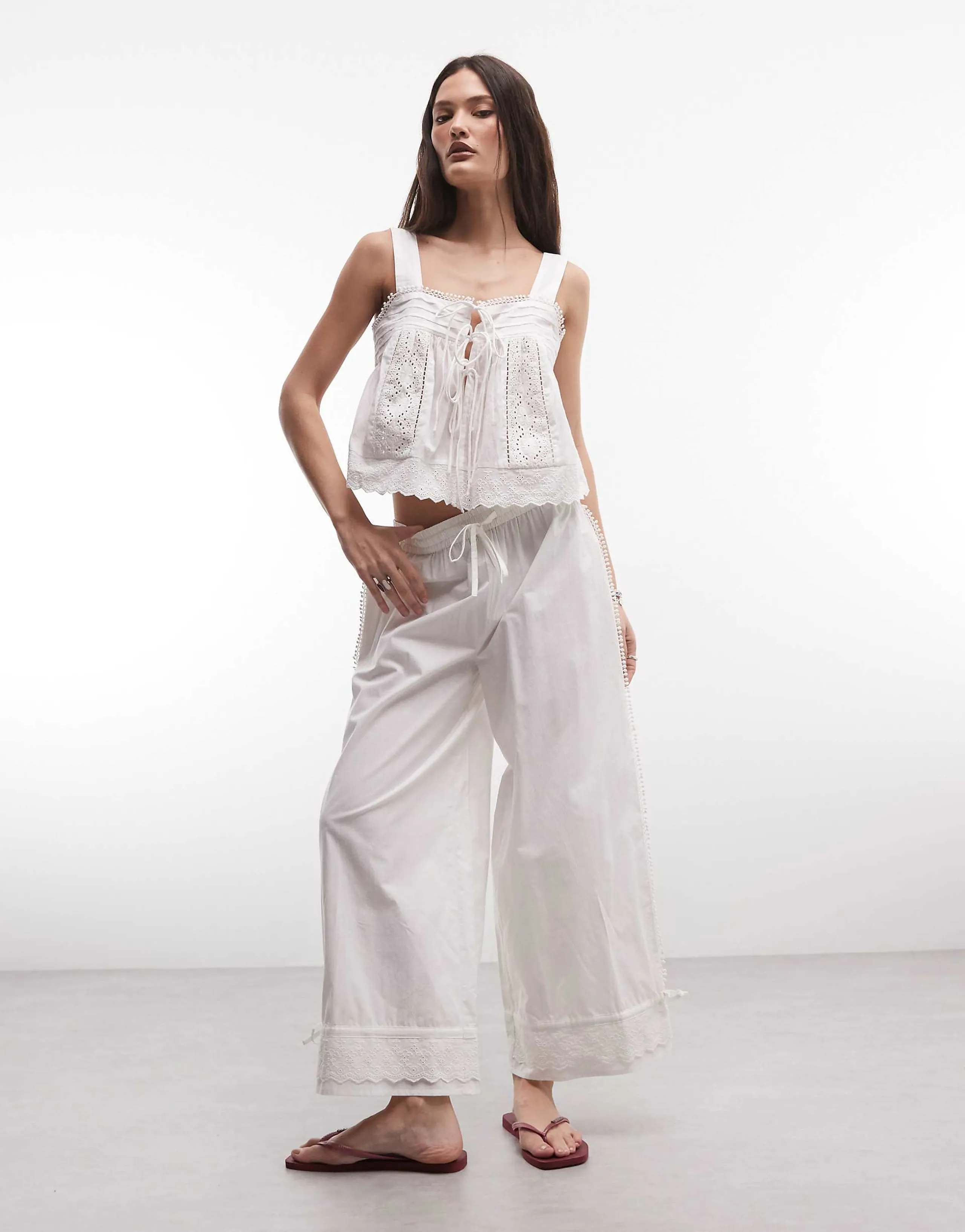 Reclaimed Vintage cropped balloon pants with eyelet hem in white