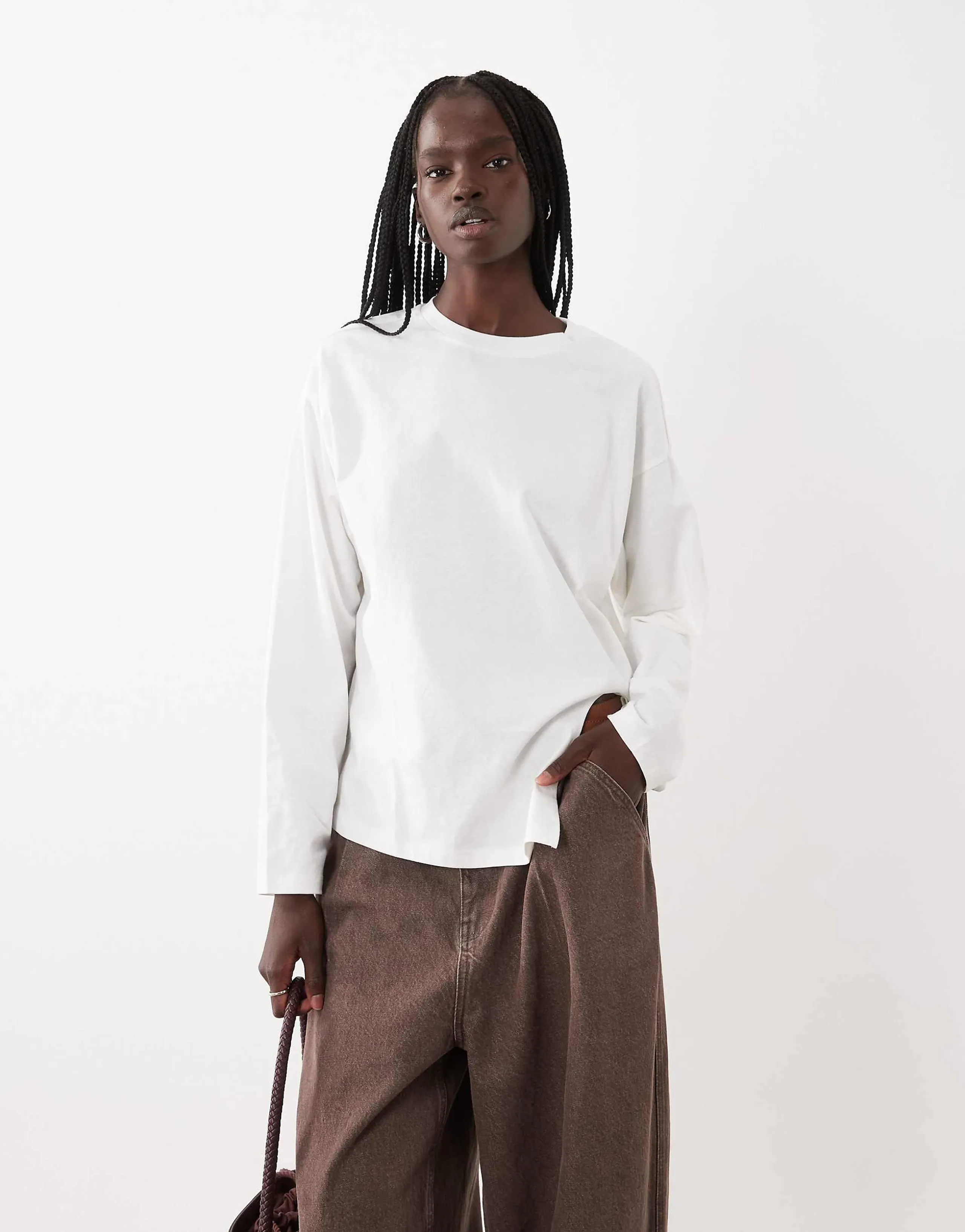 ASOS DESIGN Knotted hem detail crew neck long sleeve top in ecru