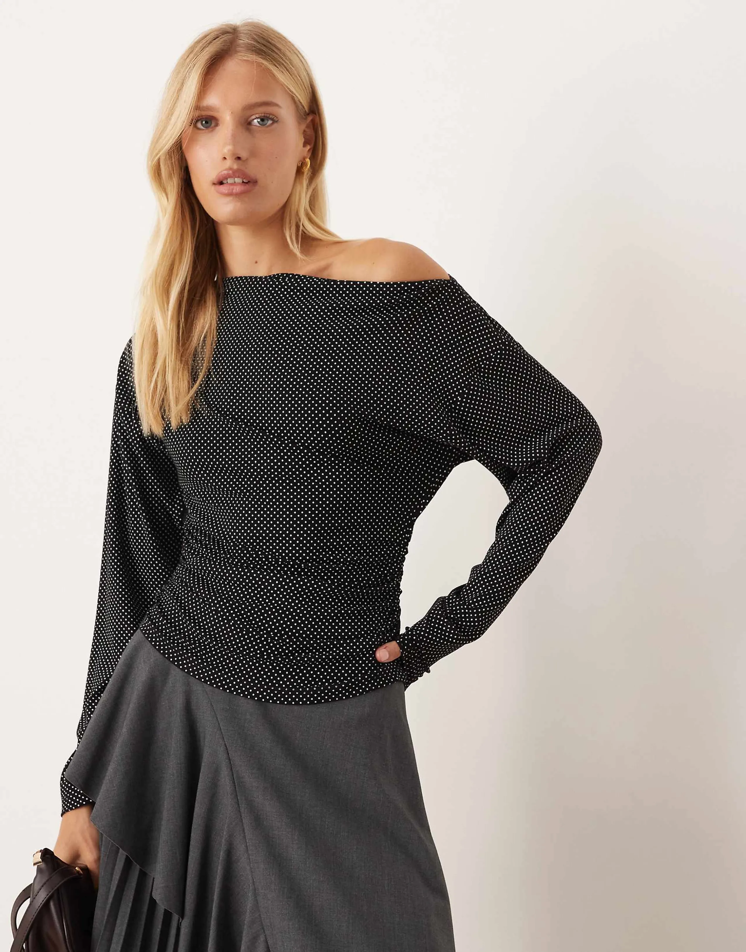 ASOS DESIGN asymmetric off shoulder polka dot top in black