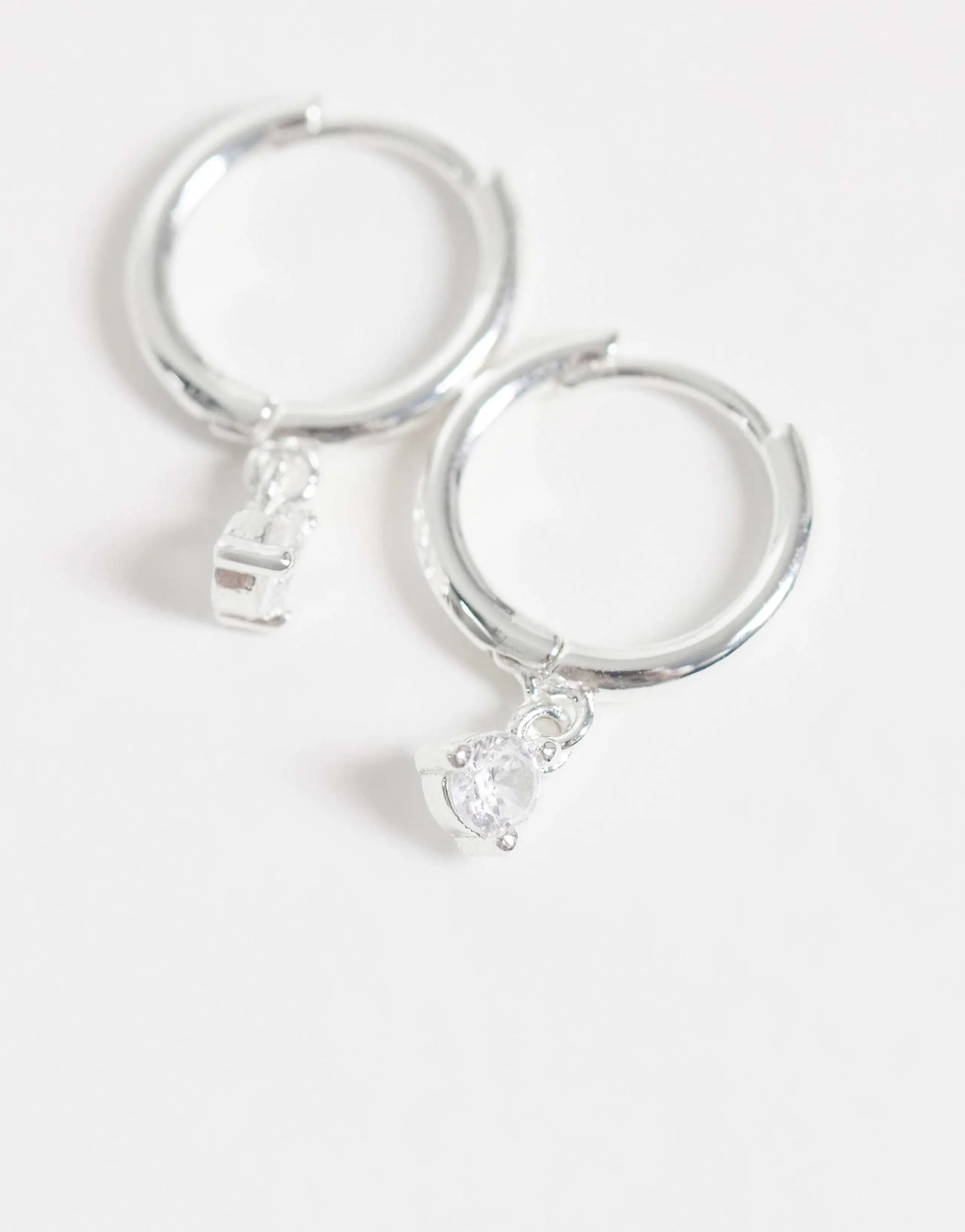 Kingsley Ryan 10mm gem set dangling hoops in sterling silver plated brass