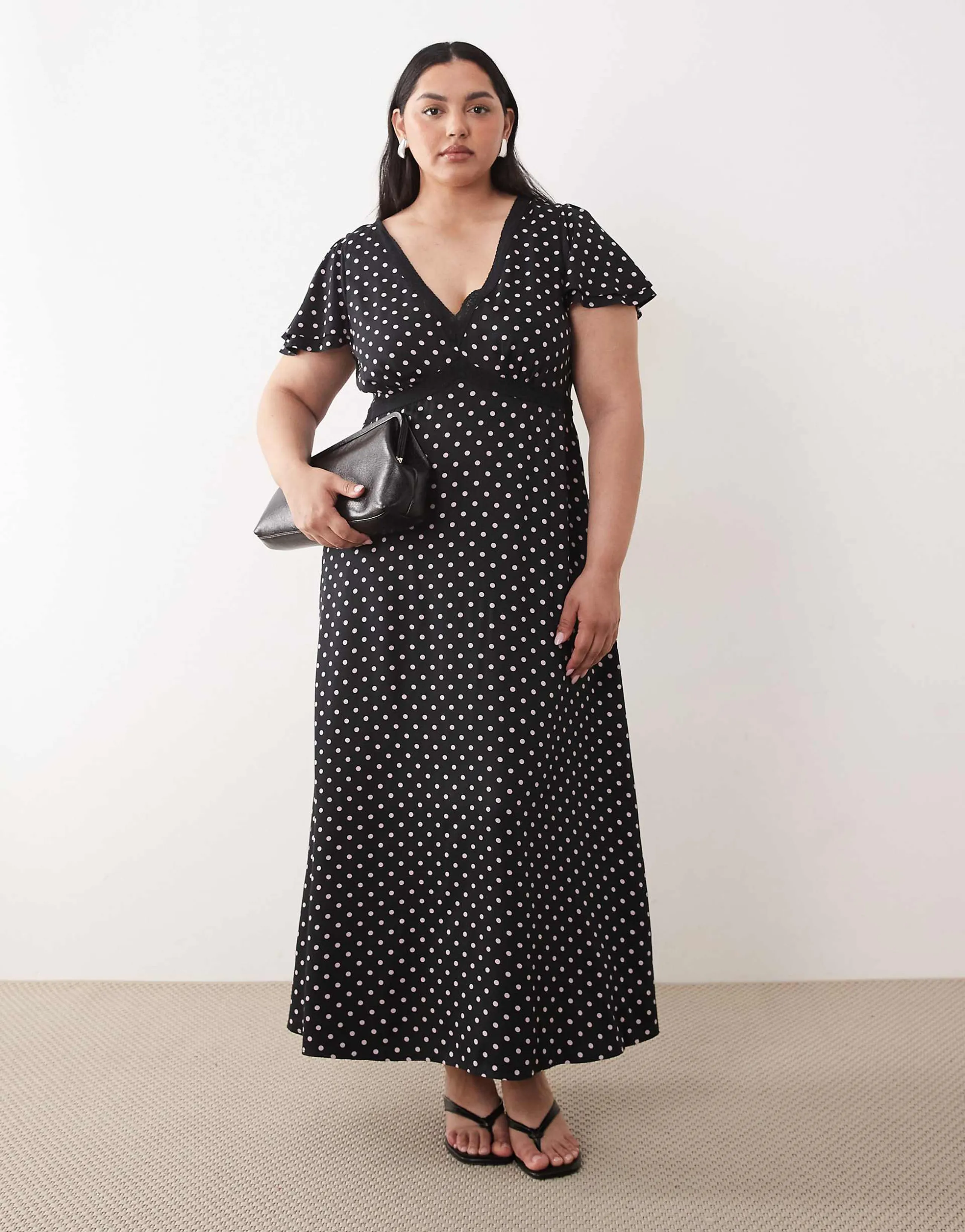 Nobody's Child Plus v-neck lace trim open back midi dress in black polka dot